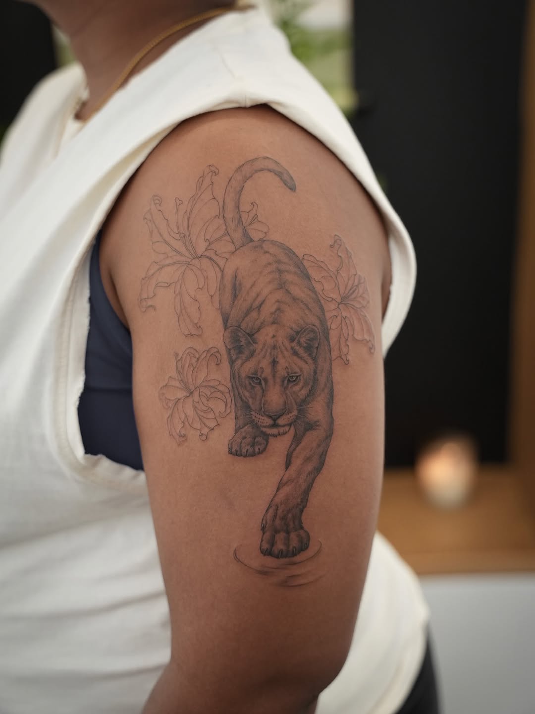Tattoo by @junh_tattoo — realism, black_and_grey