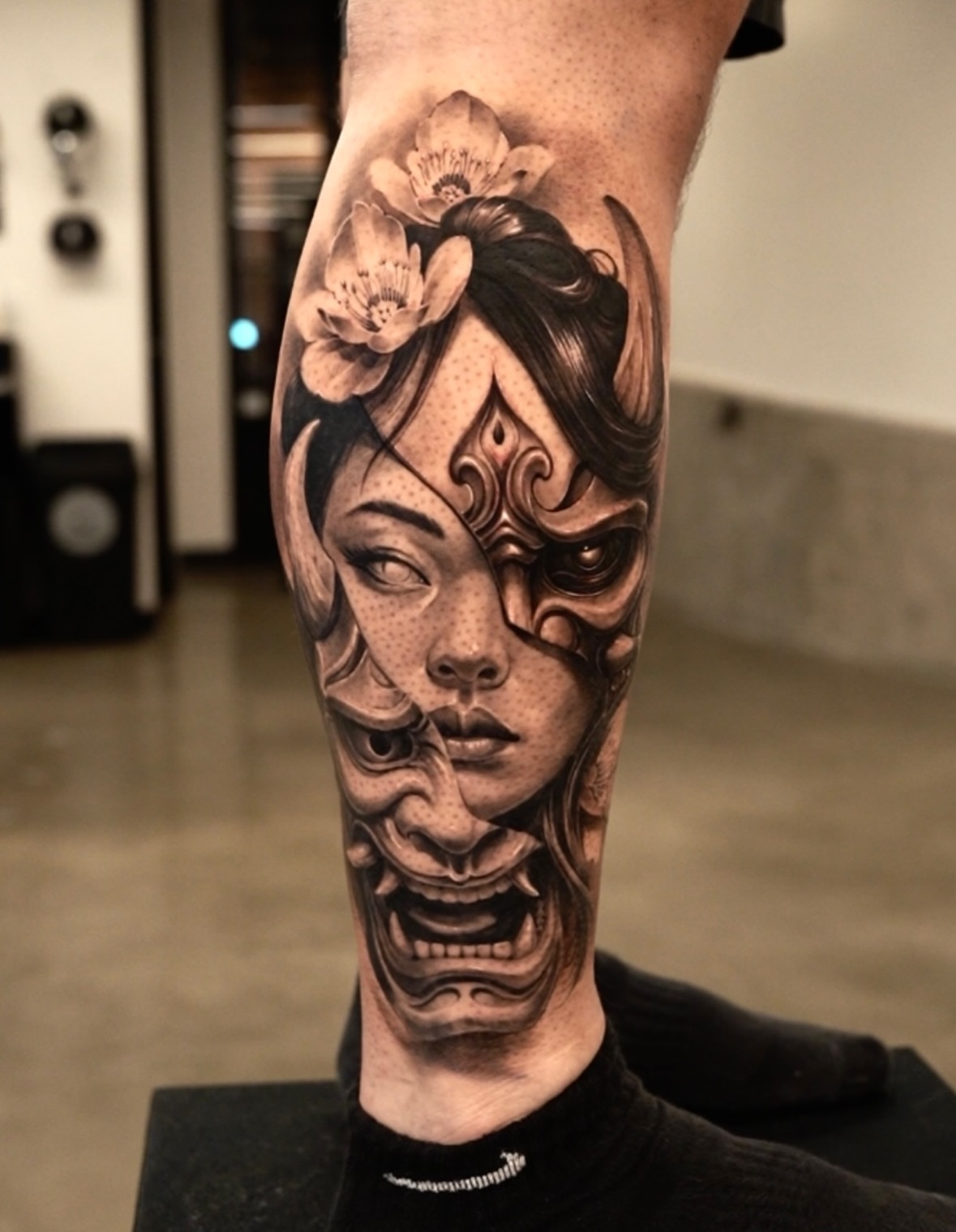 Woman's face dotwork tattoo on the forearm by Tattoo San Diego