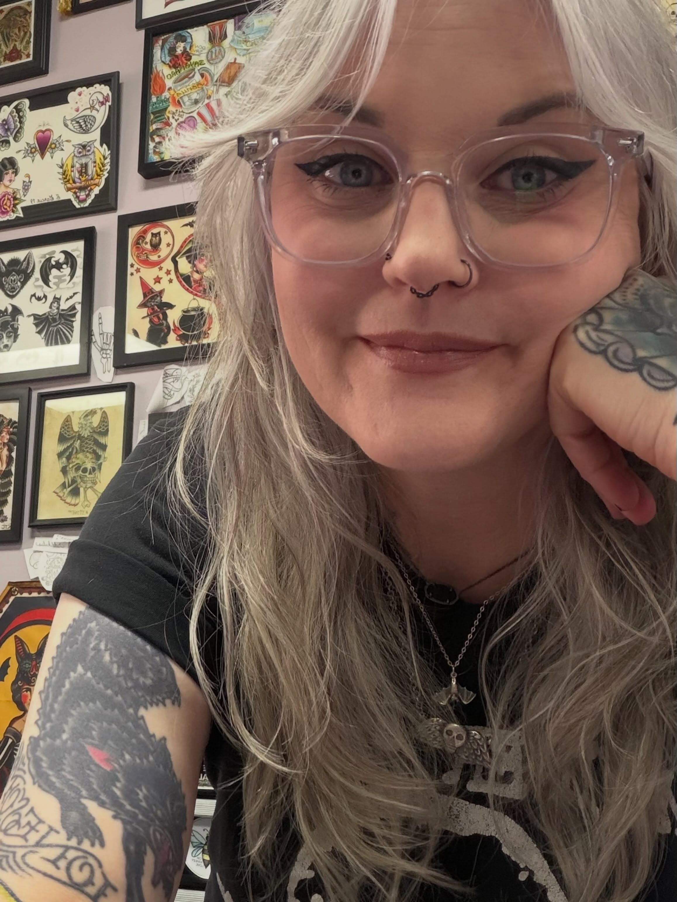 Crow American traditional tattoo on the upper arm by Sue Garcia