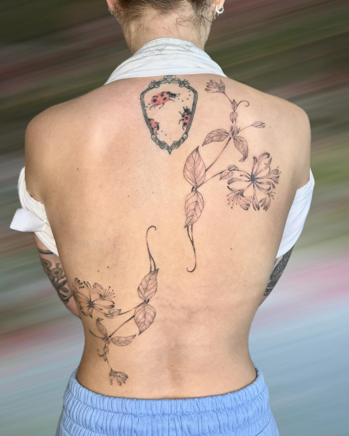 Botanical black and grey tattoo on the back by GG ๐ธ