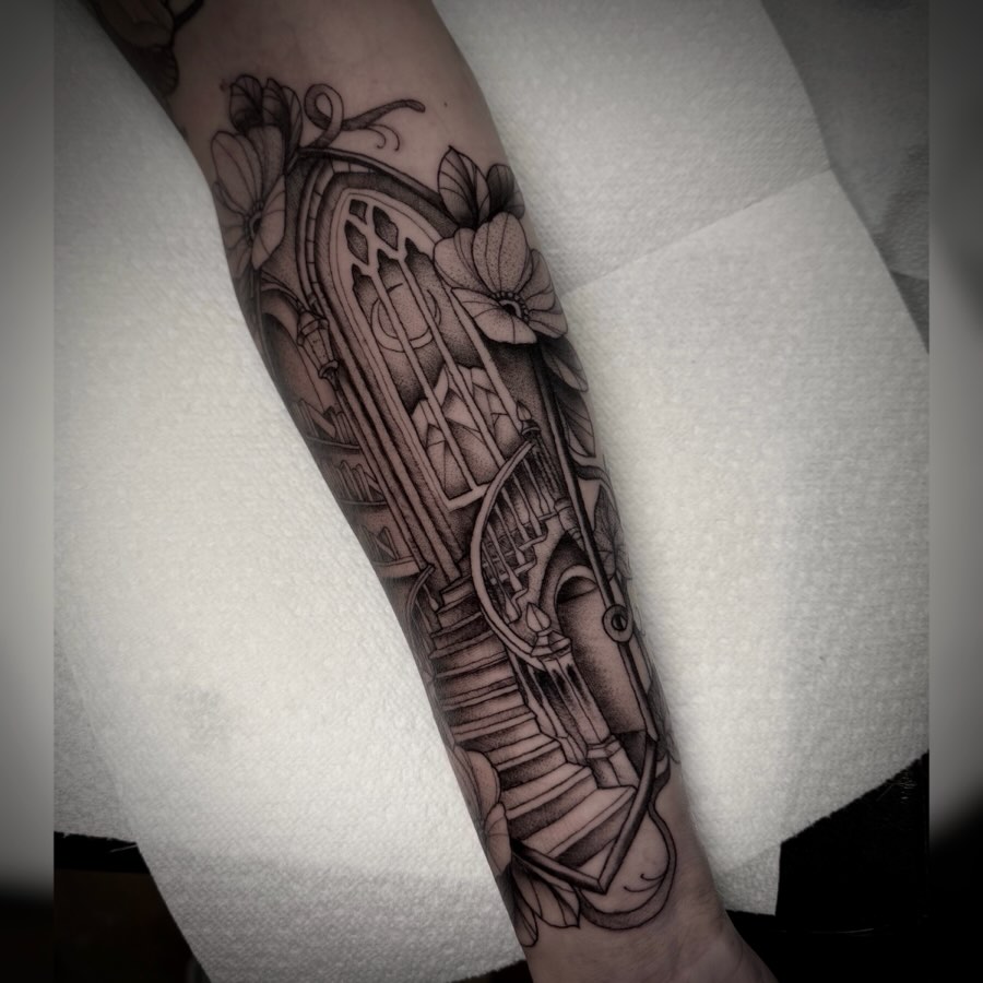 Staircase and floral geometric tattoo on the forearm by Alyssa Deeghan