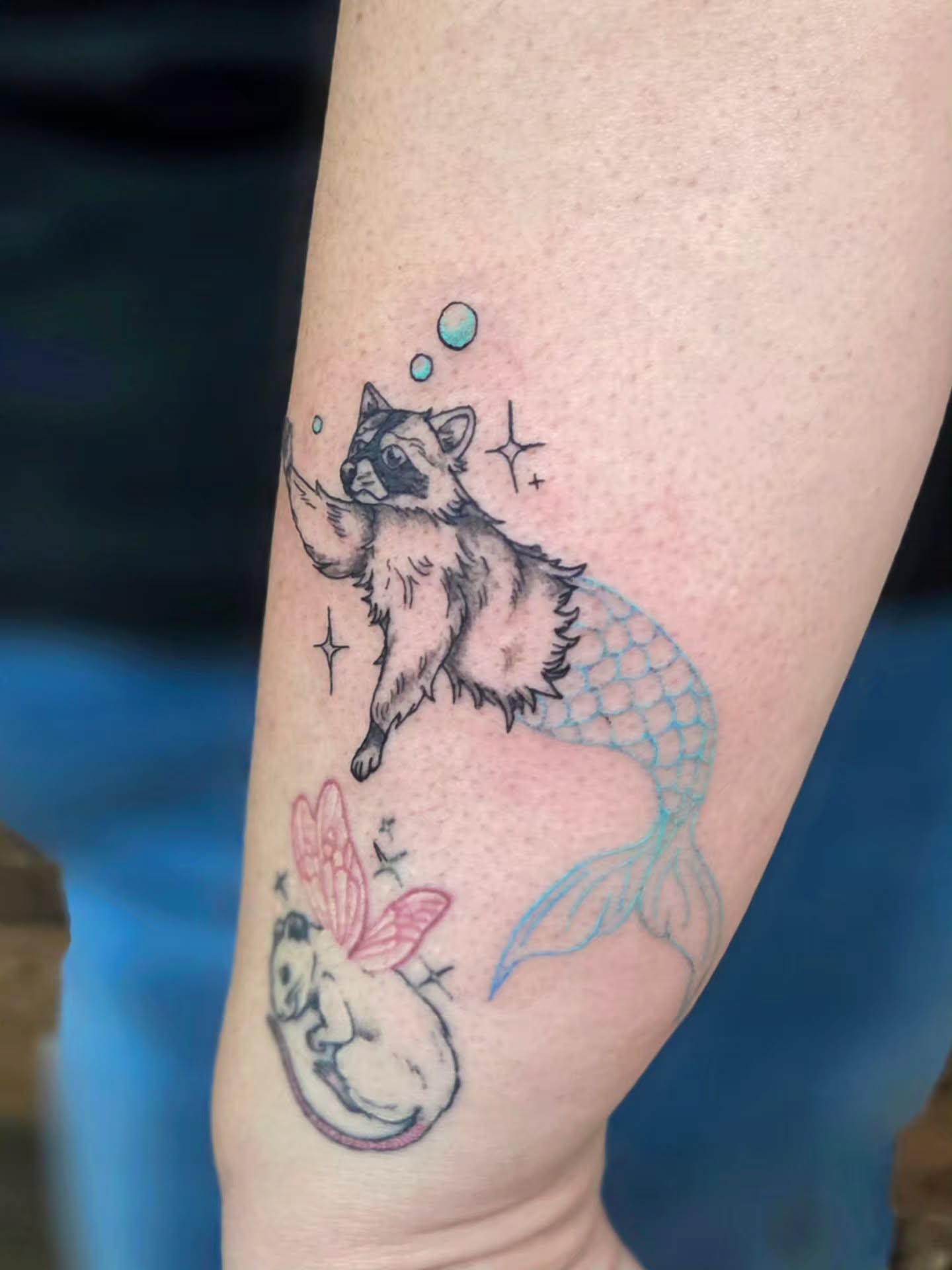 Raccoon mermaid new school tattoo on the forearm by Courtney, Lakewood, Ohio