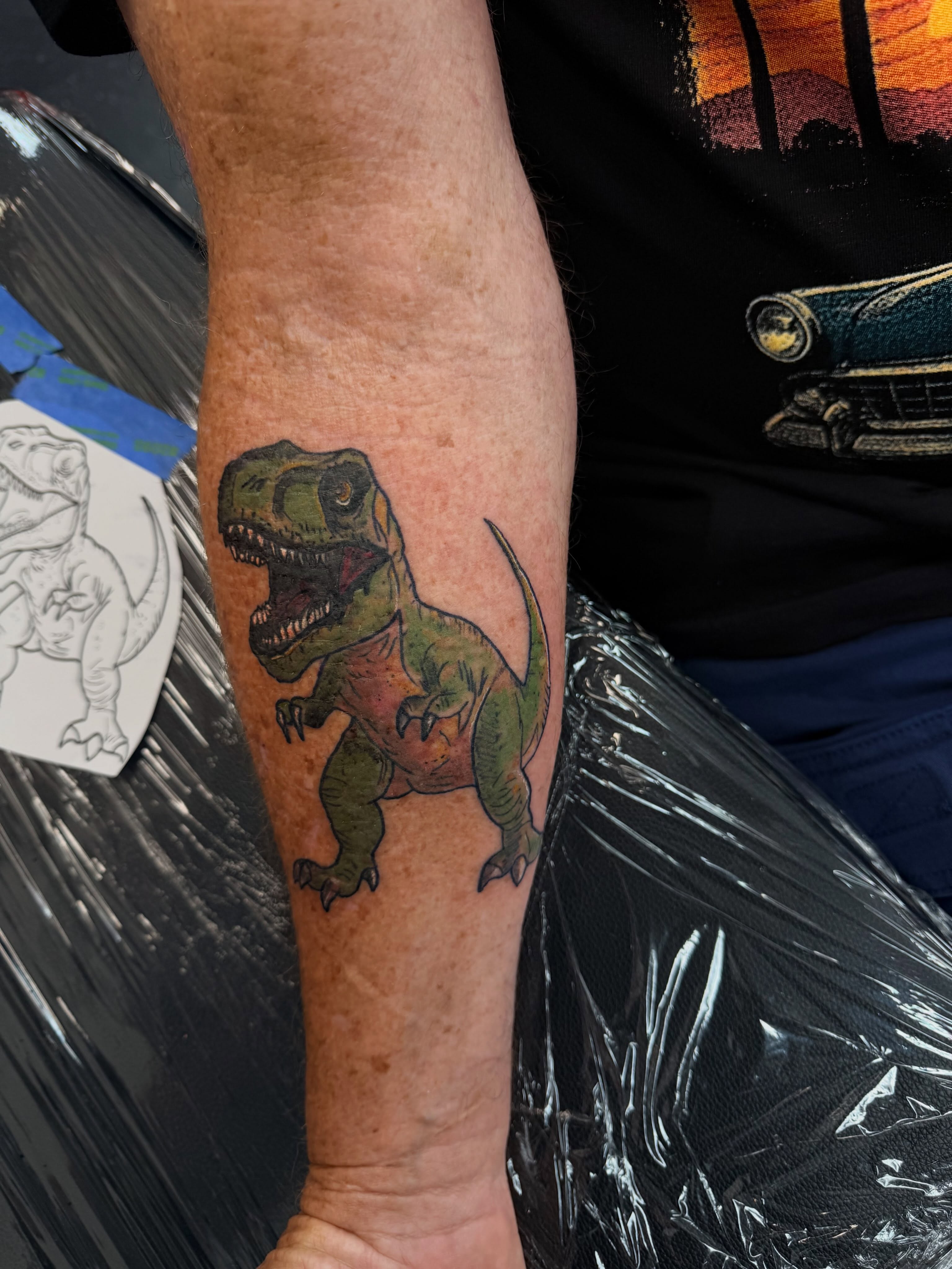 T-rex realism tattoo on the forearm by Rylan Thorndyke - Tattoo Artist, Las Vegas, Nevada