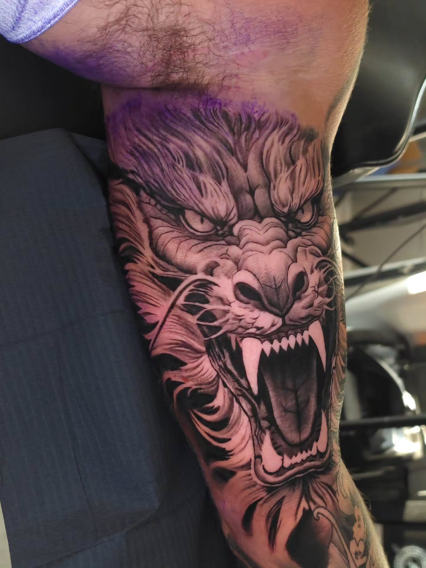 Roaring lion realism tattoo on the forearm by Javier M Davila