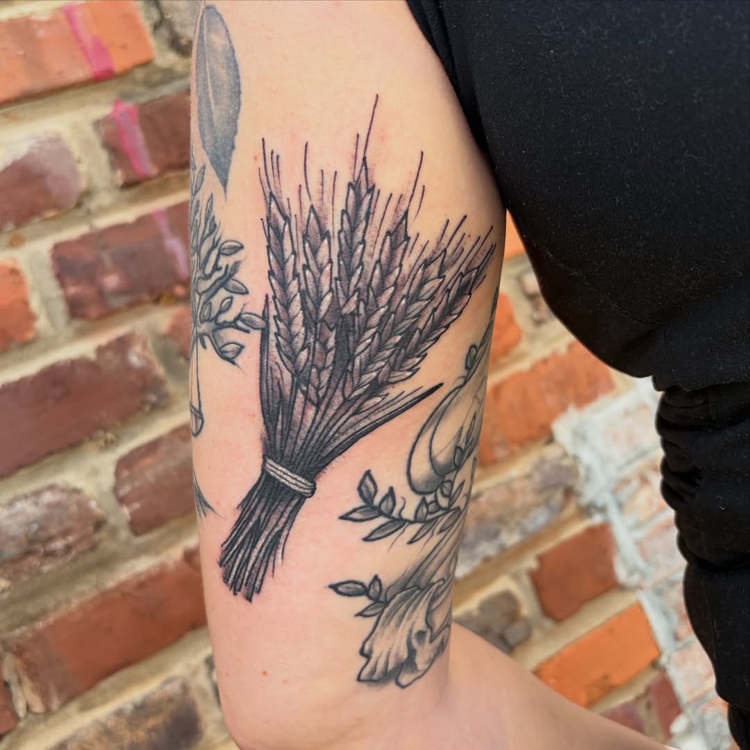 Wheat bouquet black and grey tattoo on the forearm by Vudu Tattooer