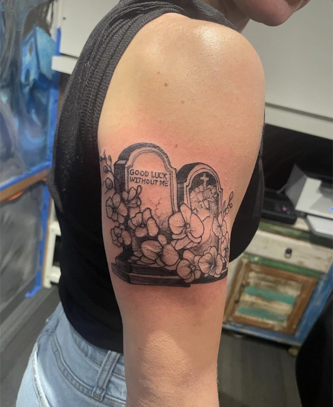 Graveyard scene black and grey tattoo on the upper arm by Josh O’ + Bird ☘️ 🪶