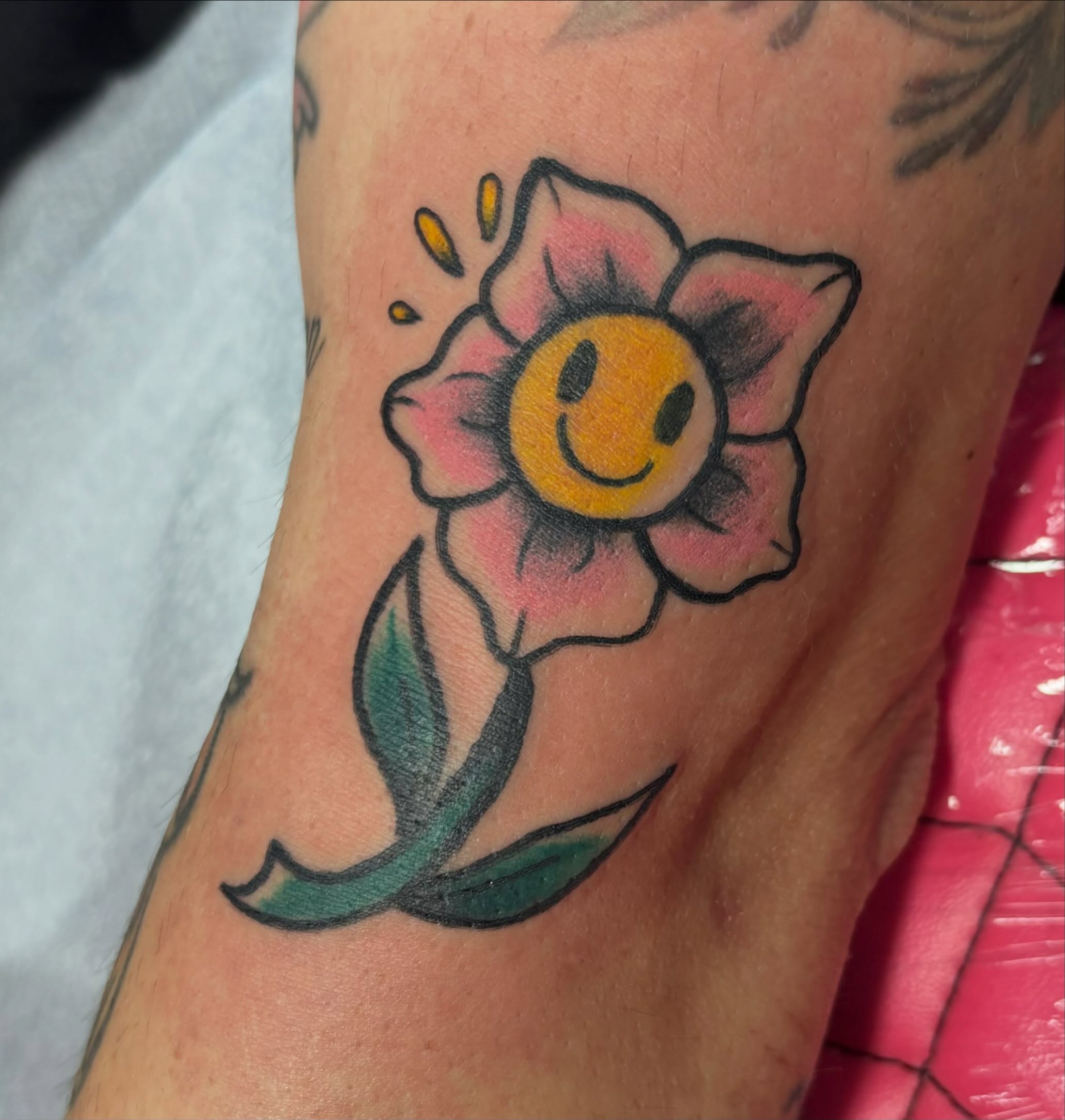 Smiling flower American traditional tattoo on the forearm by ✮ ✄ star ✮ ✄