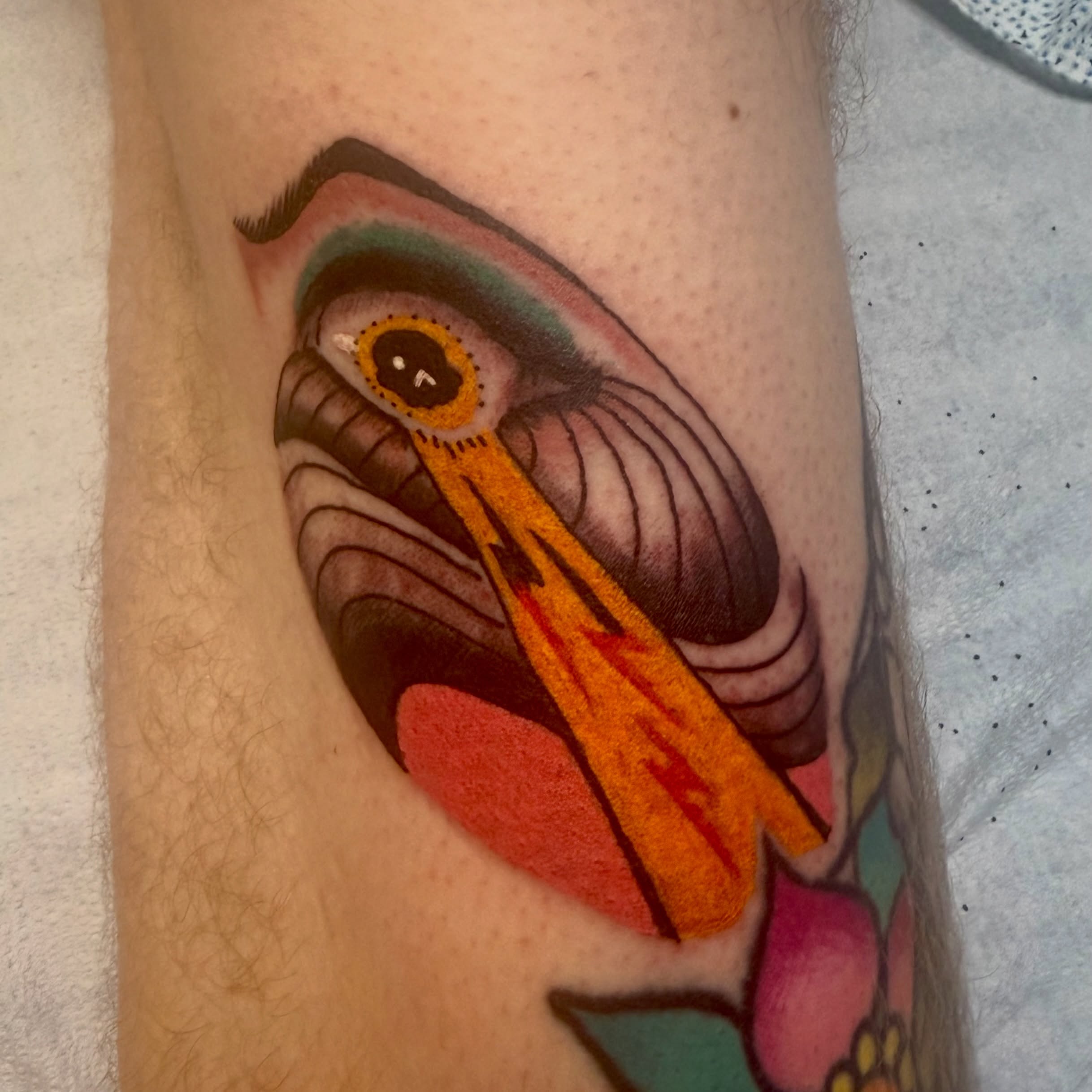 Eye and moth American traditional tattoo on the forearm by Jamie Hall, Kansas City, Missouri