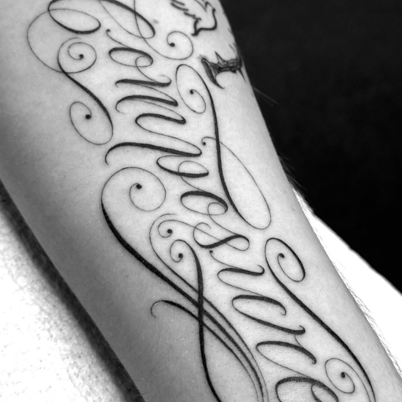 Script lettering lettering script tattoo on the forearm by Evan Wyatt