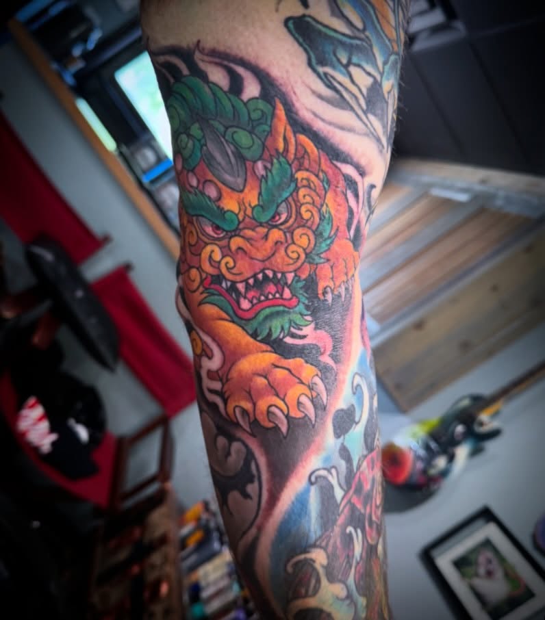 Lion japanese irezumi tattoo on the forearm by Cory Haberman