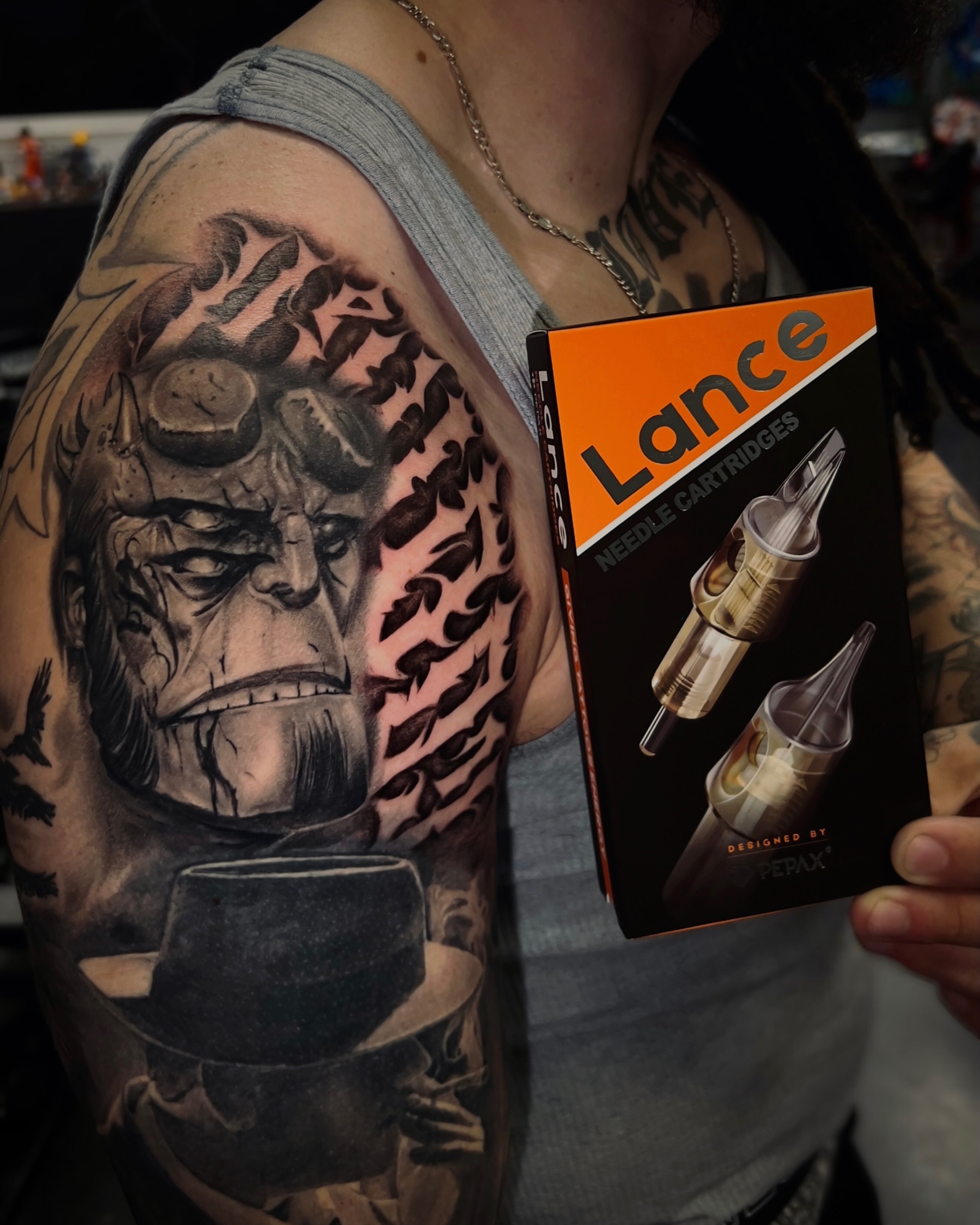 Man with steampunk goggles realism tattoo on the shoulder by Matthew Diaz