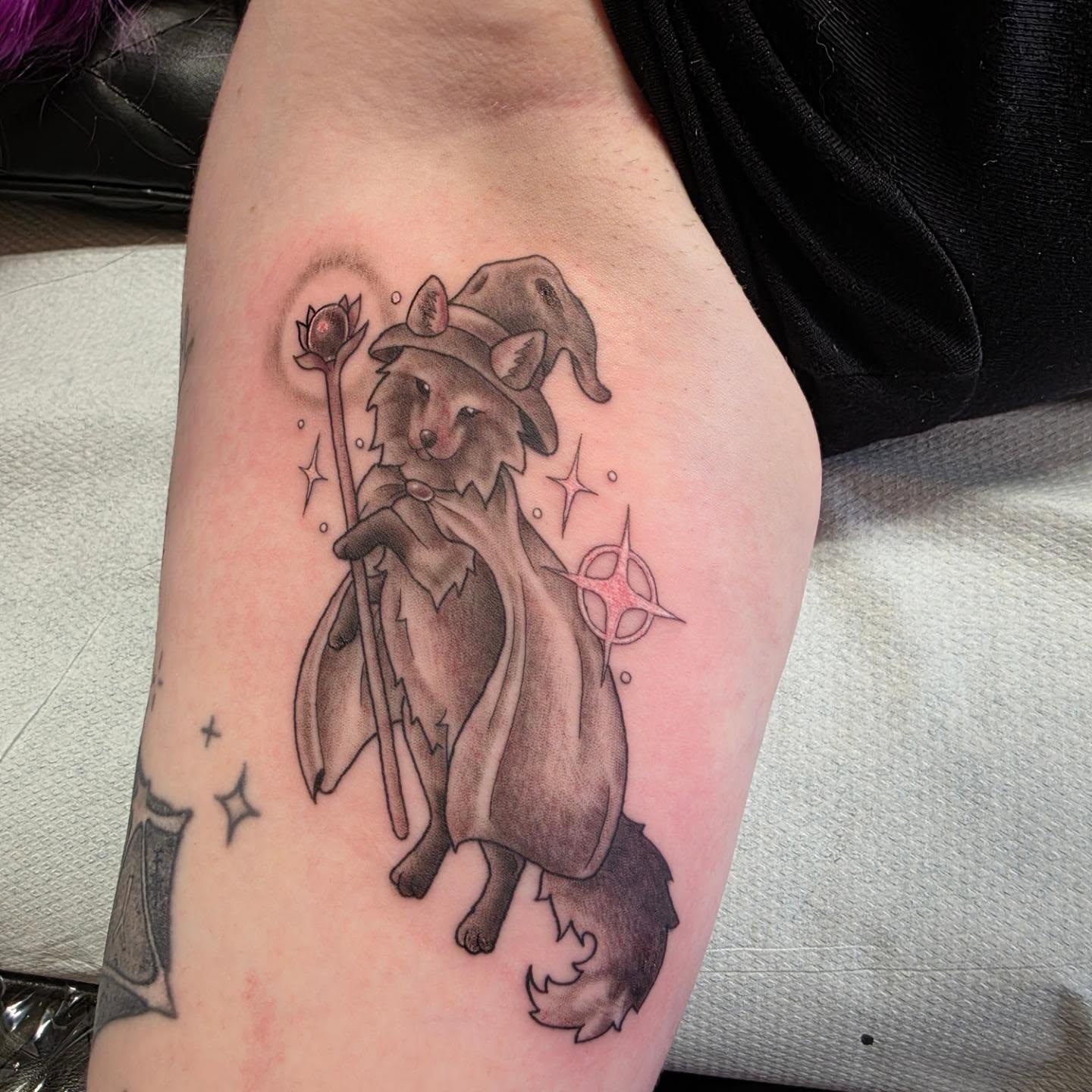 Fox wizard black and grey tattoo on the thigh by Tattoos by Annie