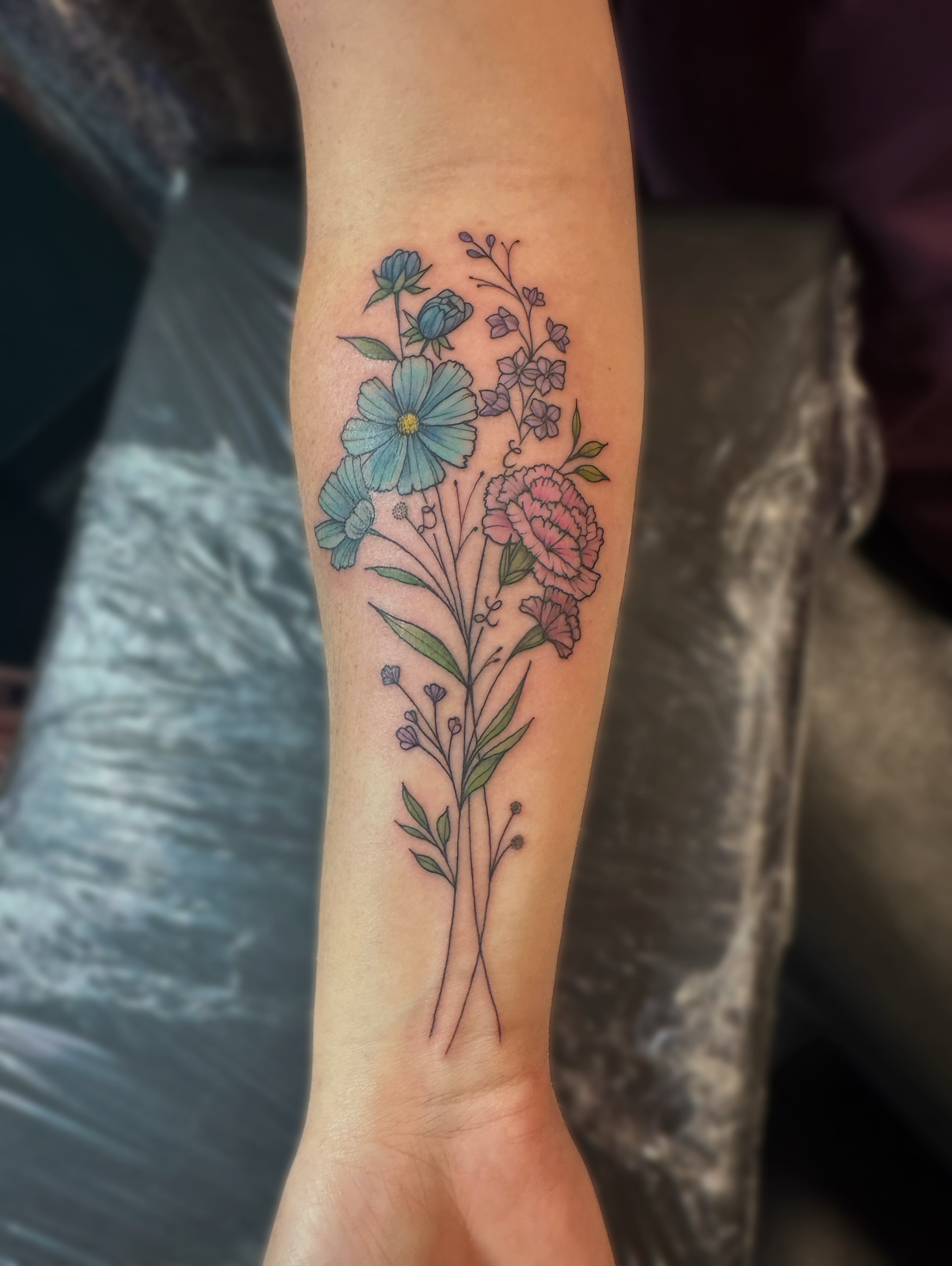 Floral bouquet new school tattoo on the forearm by Kelsey 🖤 Tattoo Artist, Waterford Township