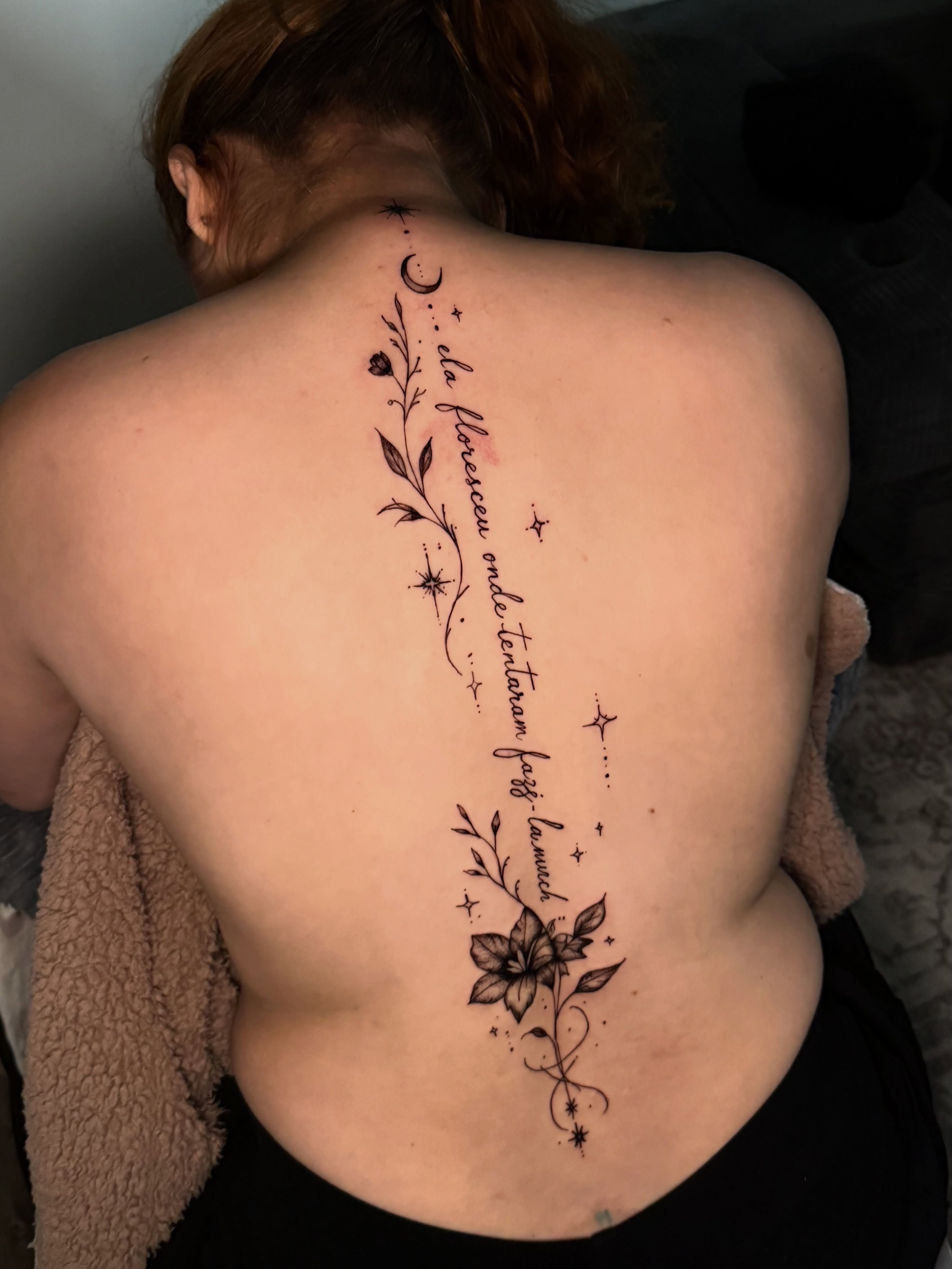 Script lettering lettering script tattoo on the back by Sebastian martinez, Memphis, Tennessee