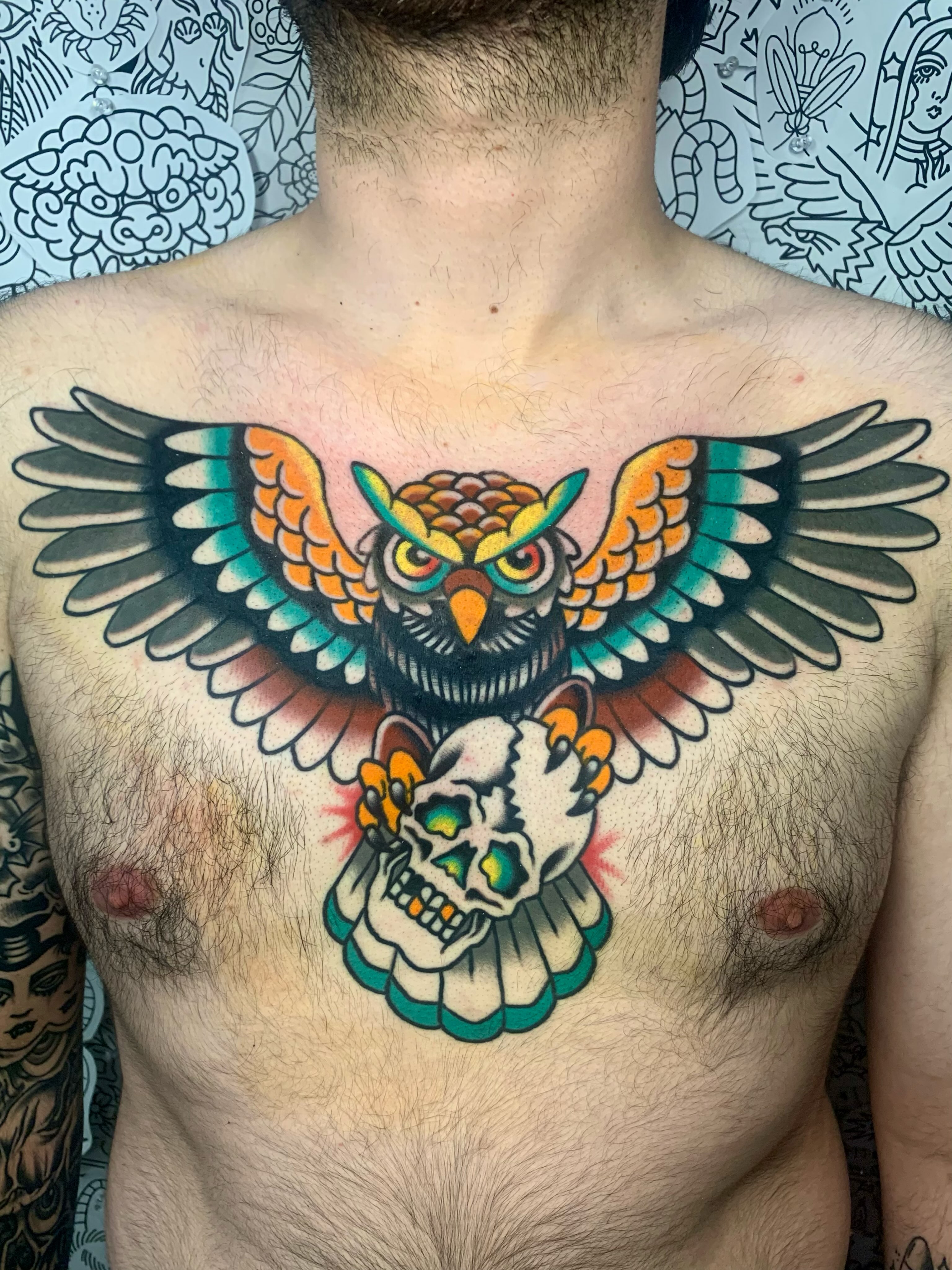 Owl and skull American traditional tattoo on the chest by Shawn VanKirk