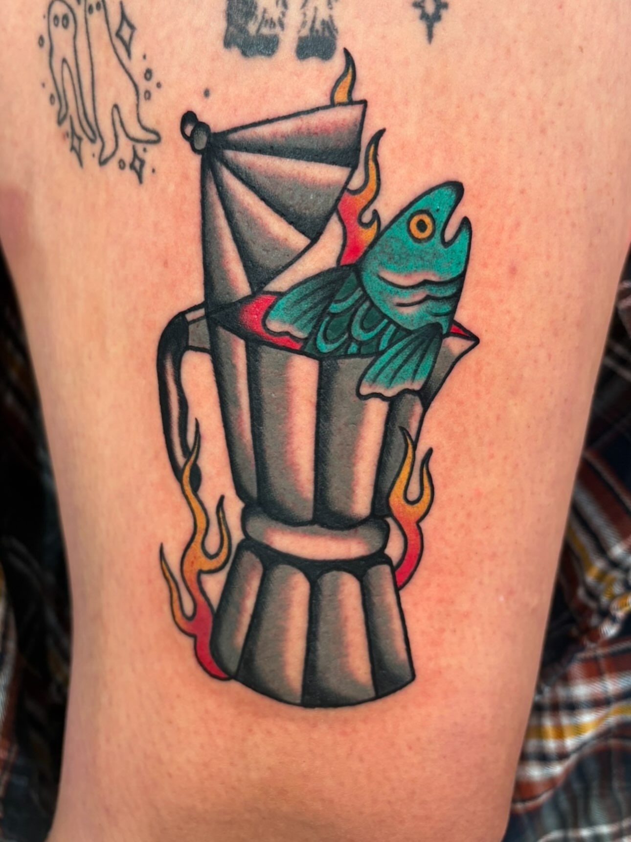 Fish in coffee pot American traditional tattoo on the thigh by Lorelei
