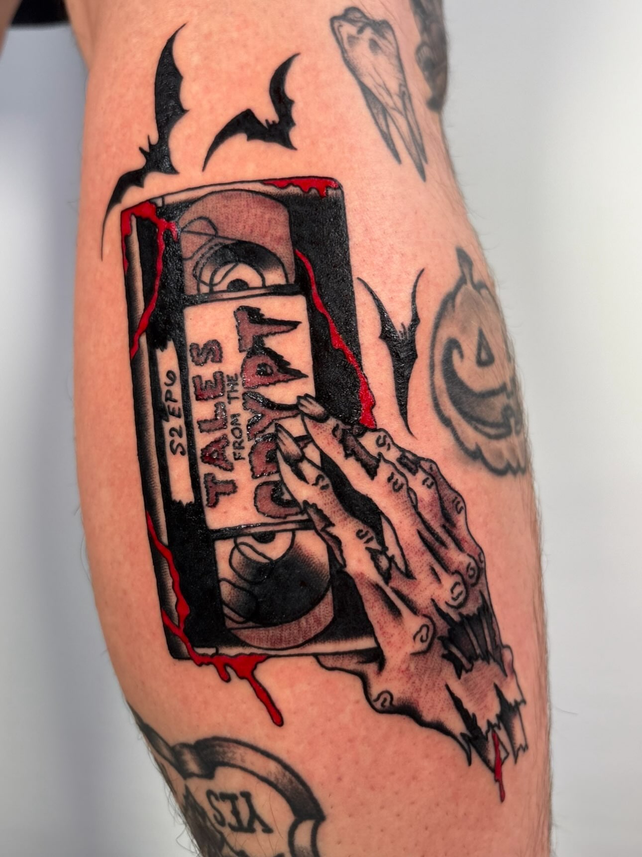 Tapes and hands American traditional tattoo on the forearm by Lorelei