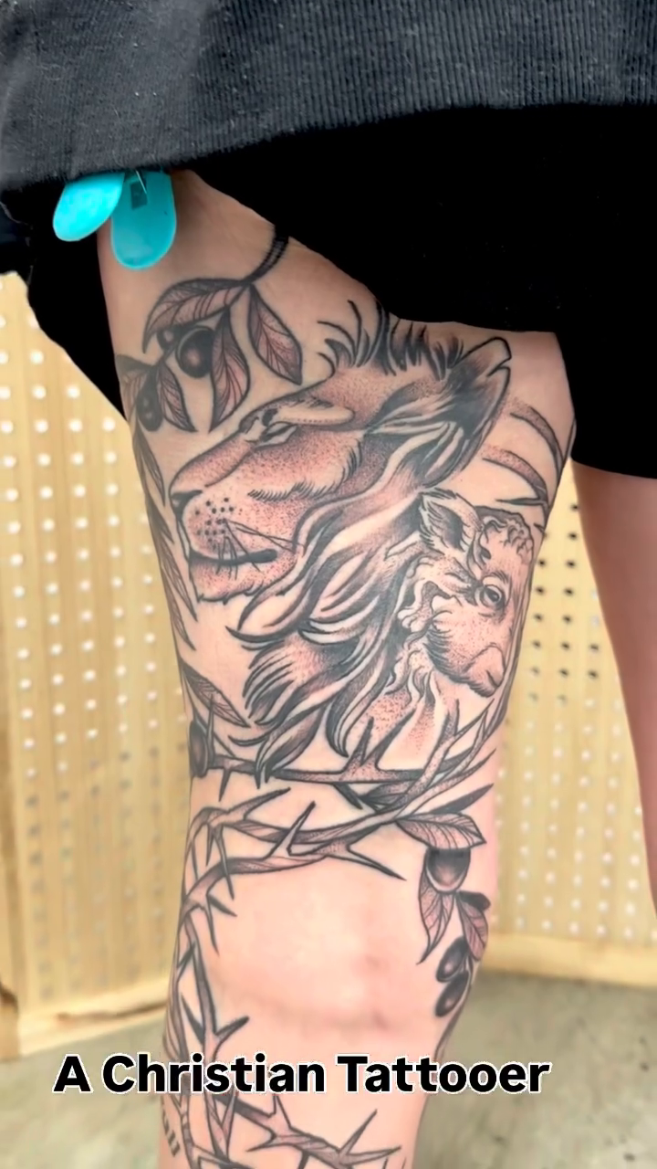 Woman with floral elements and text realism tattoo by Vincent Merys
