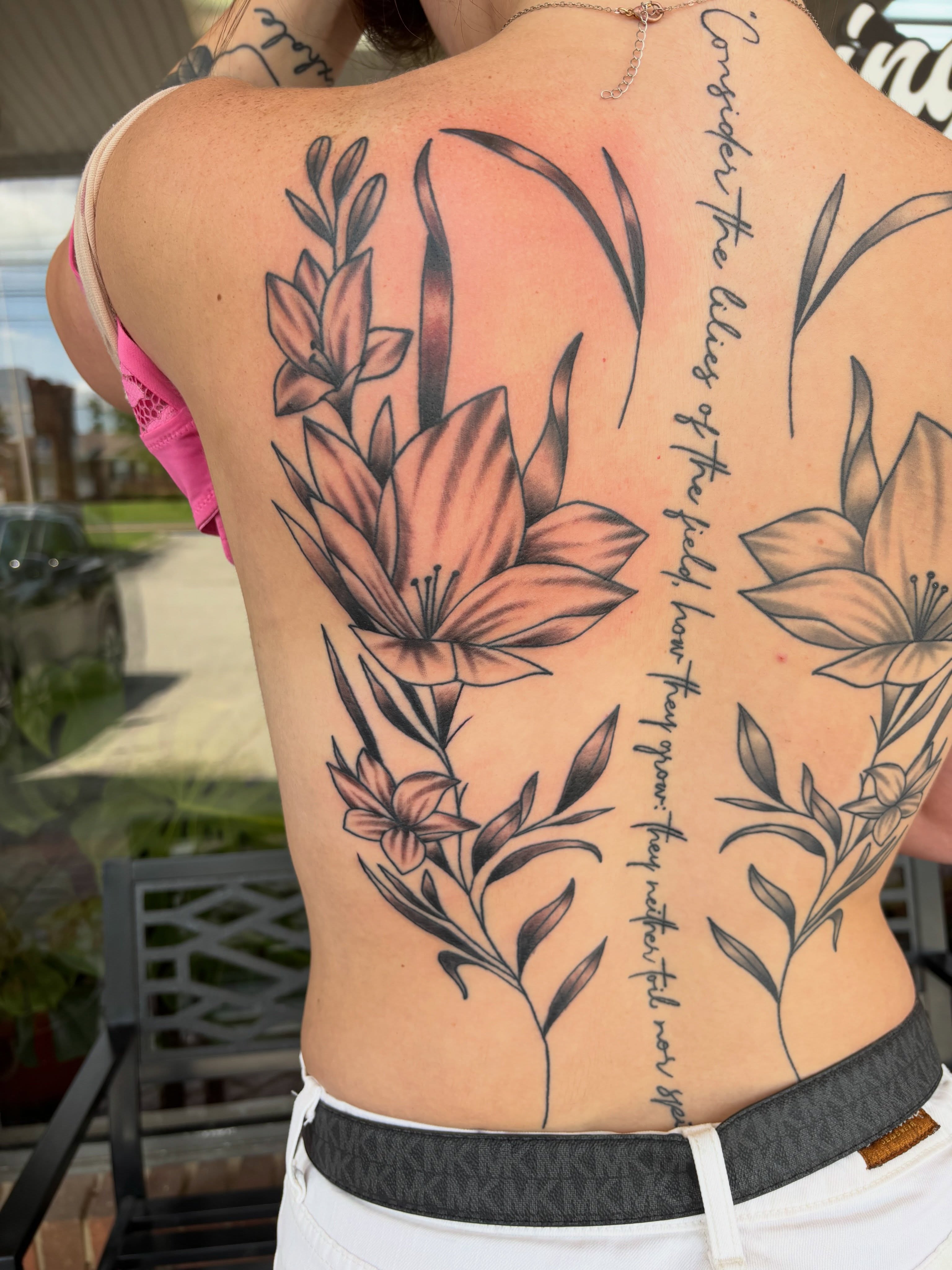 Lilies black and grey tattoo on the back by AARON MASTERS - Tattoo Artist