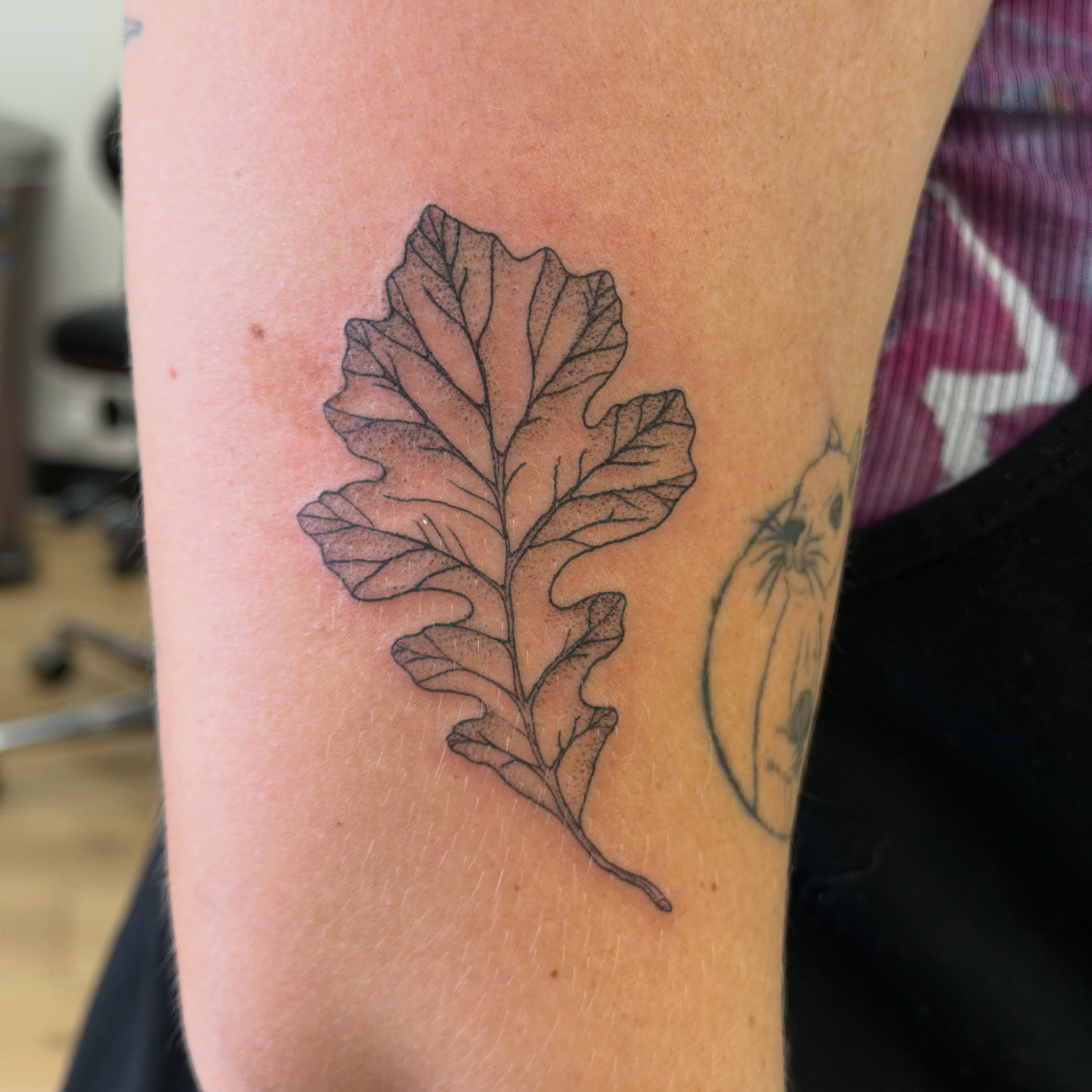 Oak leaf black and grey tattoo on the forearm by Stvn Geyer, Urbandale, Iowa