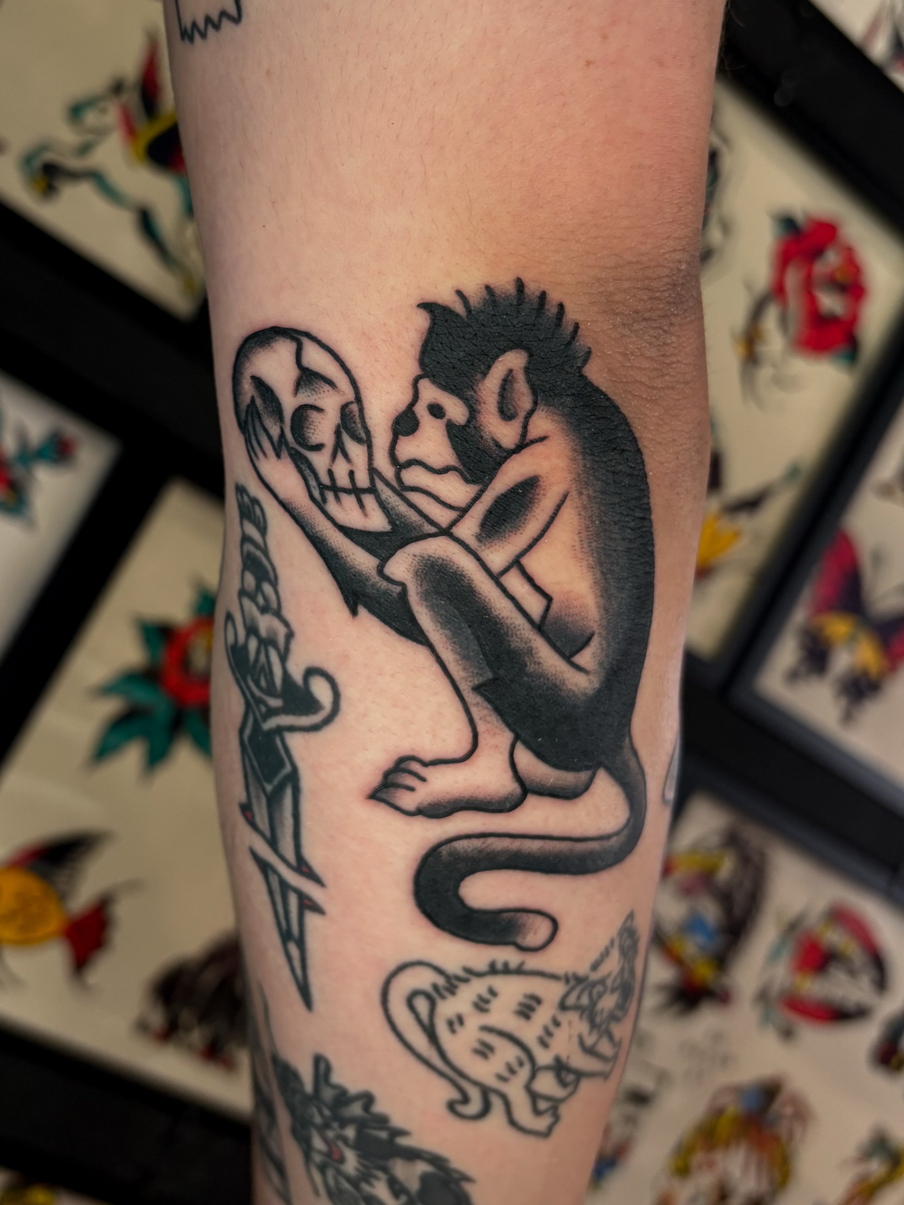 Monkey and skull American traditional tattoo on the forearm by Evan Bisso, Philadelphia, Pennsylvania