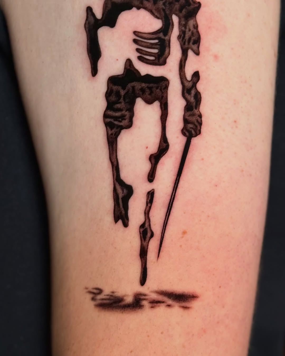 Melting skeleton with knife dark art tattoo on the forearm by Scott!!!