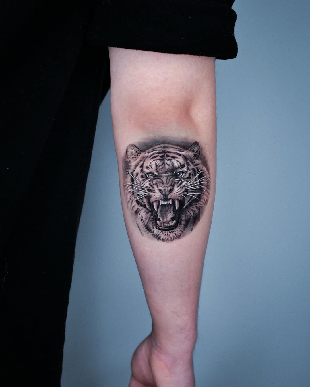 Tattoo by @hudiny_tattoo — realism, black_and_grey