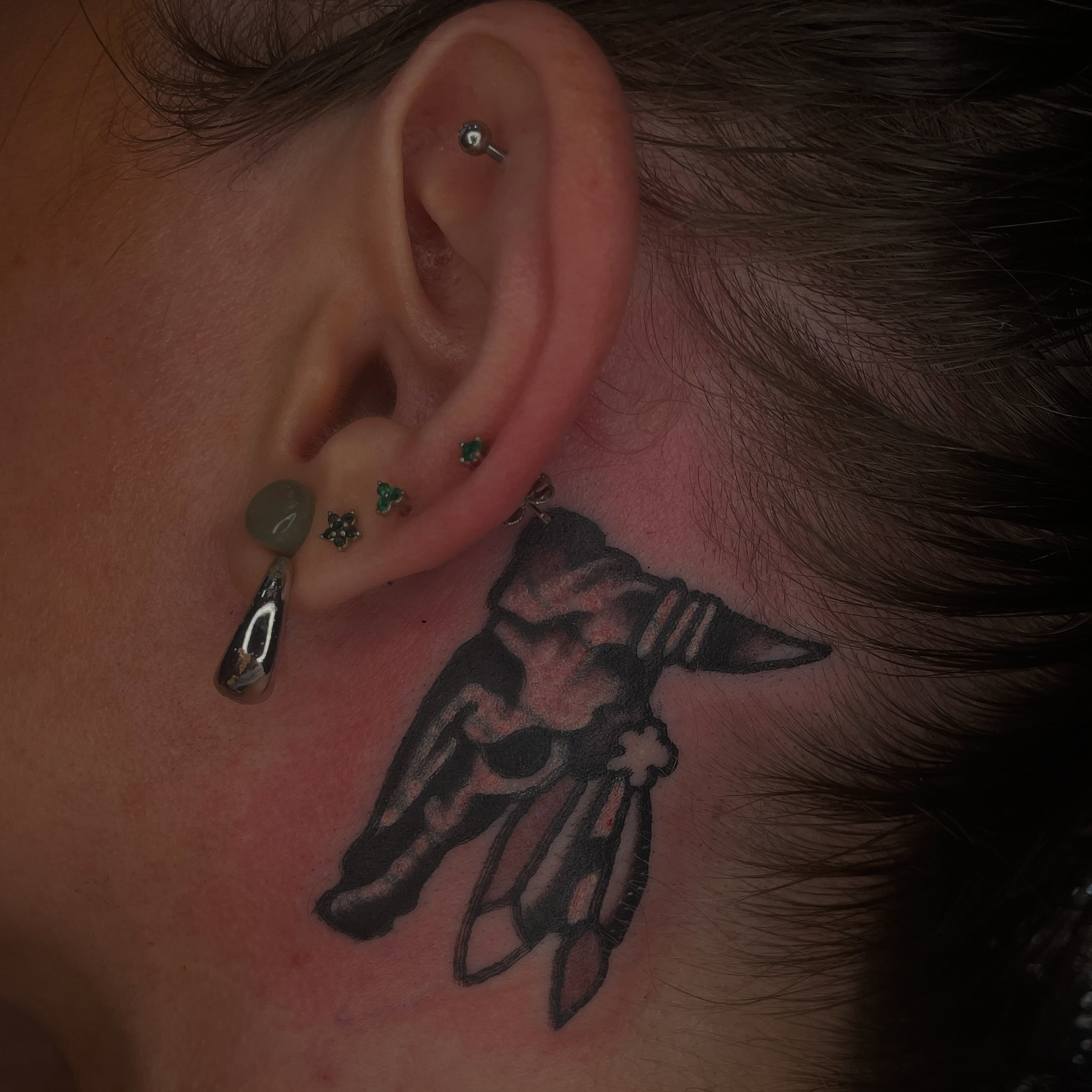 Bull skull black and grey tattoo on the neck by Nicholas M. Passeri
