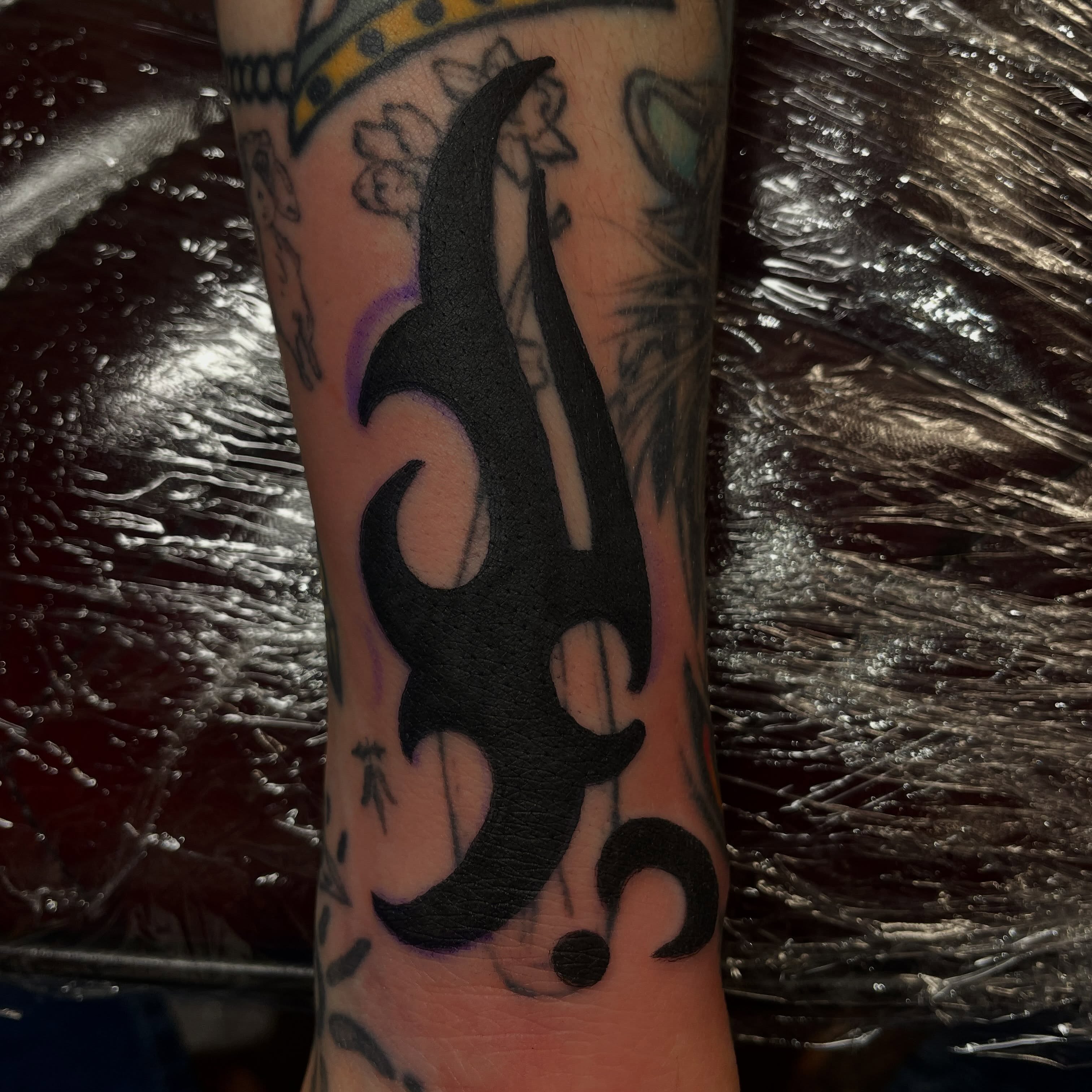 Tribal design tribal tattoo on the forearm by Nicholas M. Passeri