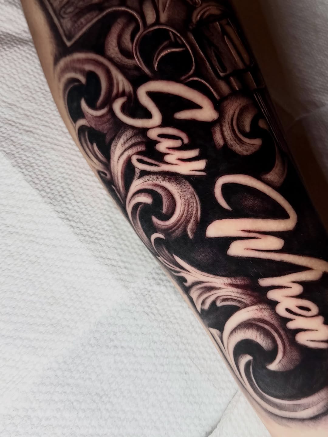 Tattoo by @labonte.tattoos — lettering_script, black_and_grey