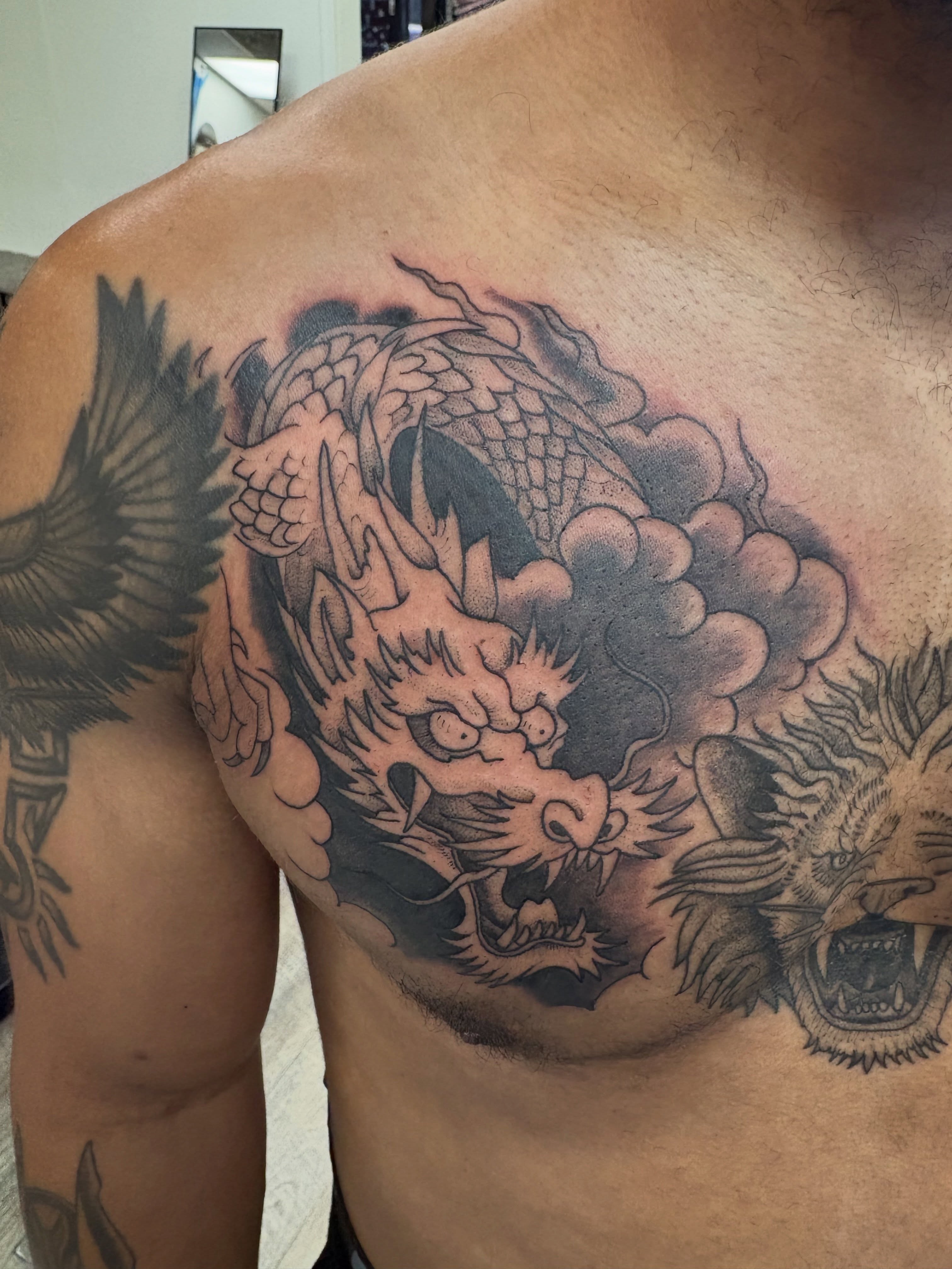 Dragon japanese irezumi tattoo on the chest by Jason Allen, Avondale, Arizona