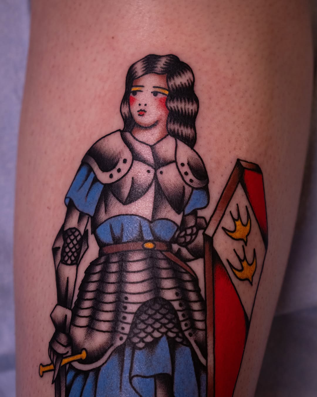 Female knight American traditional tattoo on the forearm by Justin Rakowski
