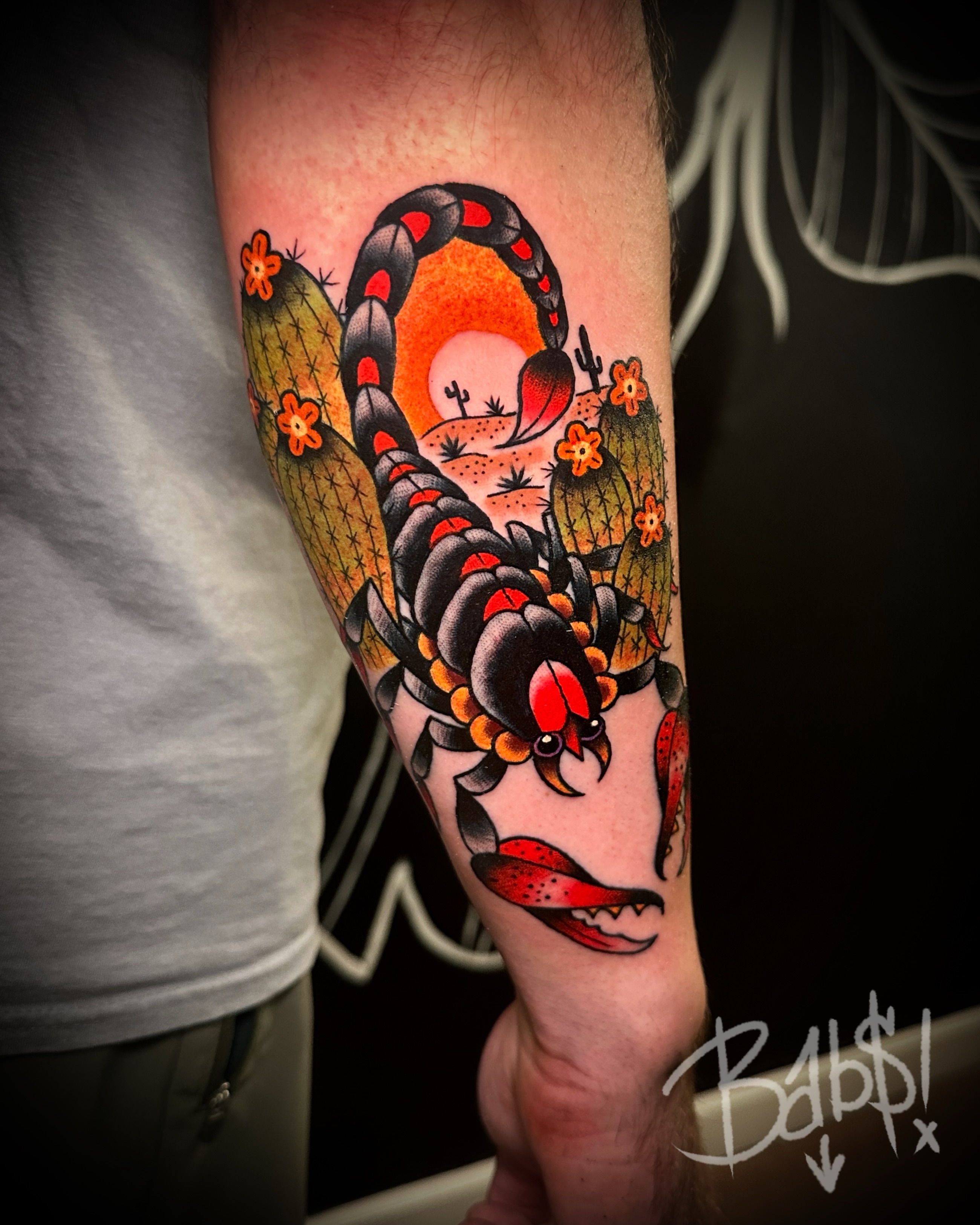 Snake and cactus American traditional tattoo on the forearm by Justin B