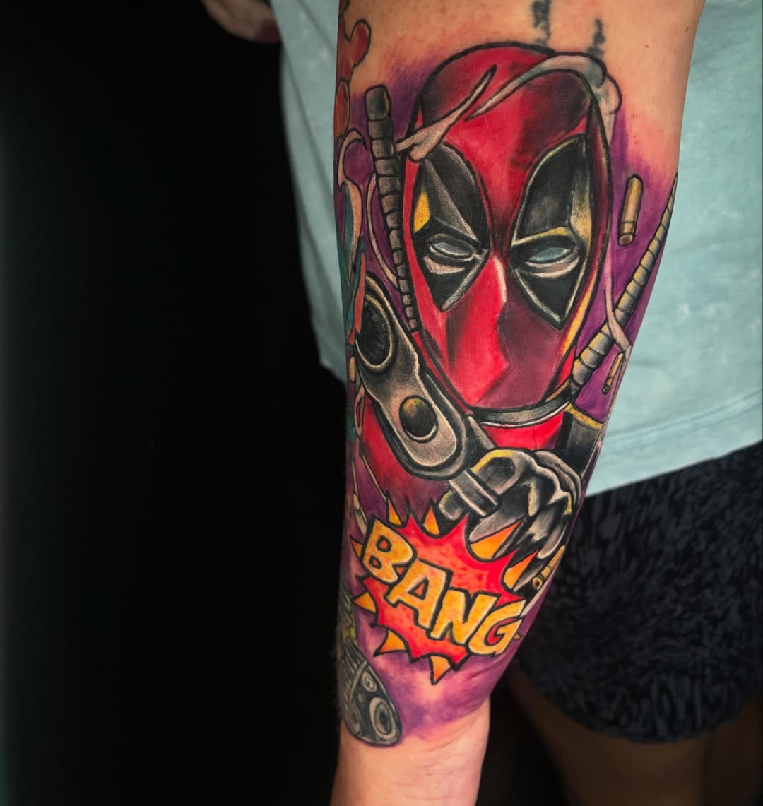 Deadpool new school tattoo on the forearm by Glen Wallis