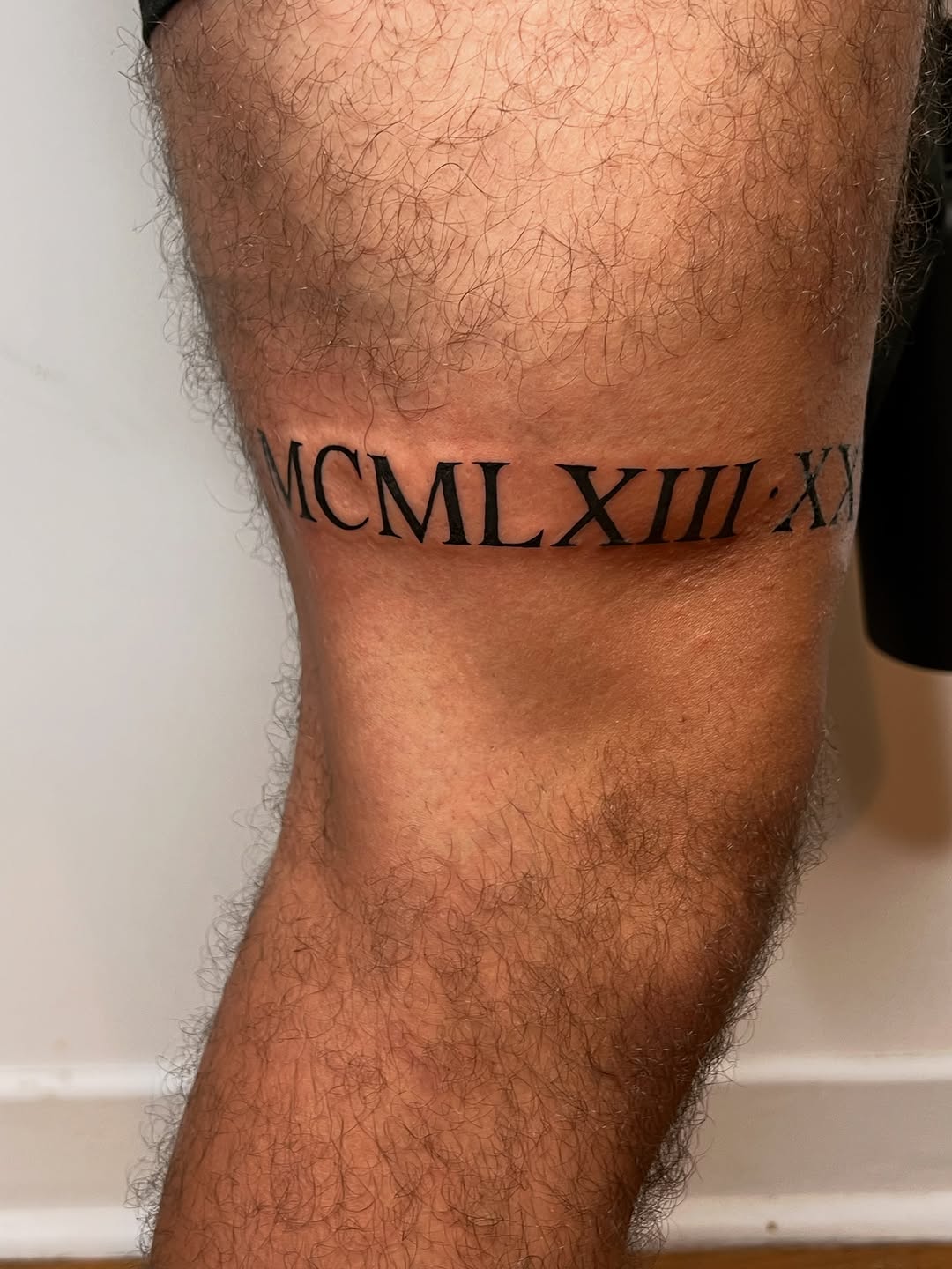 Roman numerals lettering tattoo on the forearm by Juan pablo, Toronto, Ontario