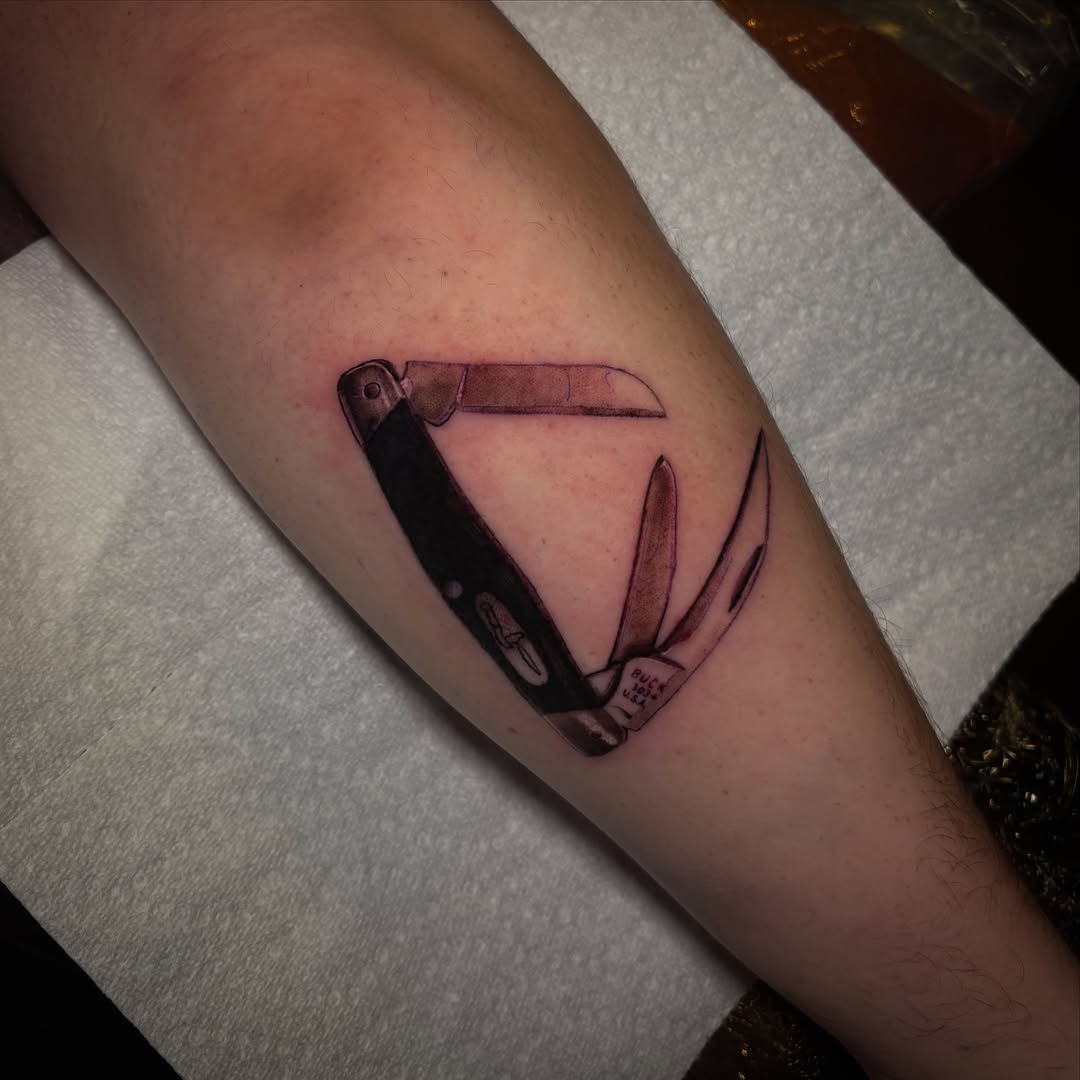 Penknife realism tattoo on the forearm by Haley Byers