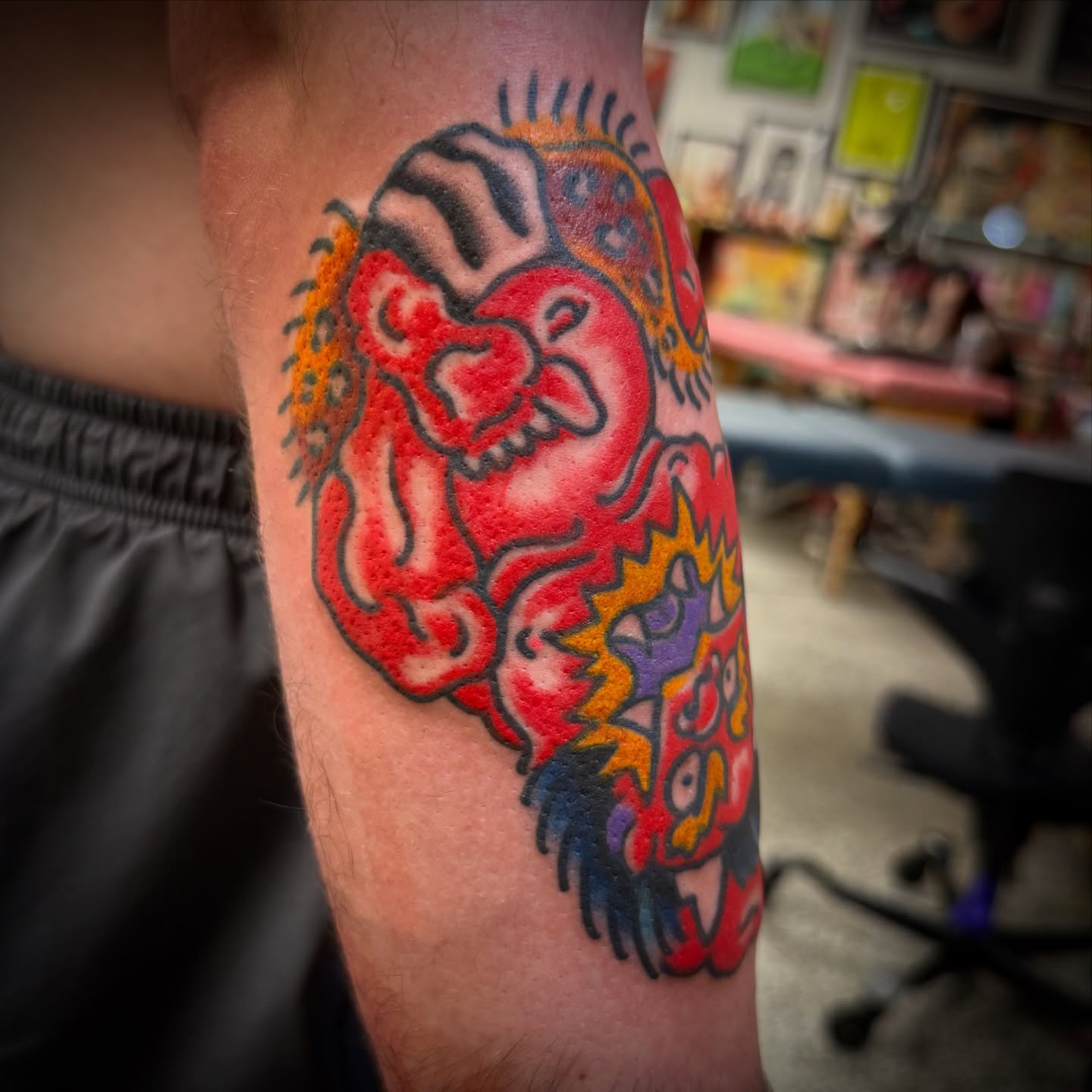 Lion American traditional tattoo on the forearm by Chuck Paprocki, Nashville, Tennessee