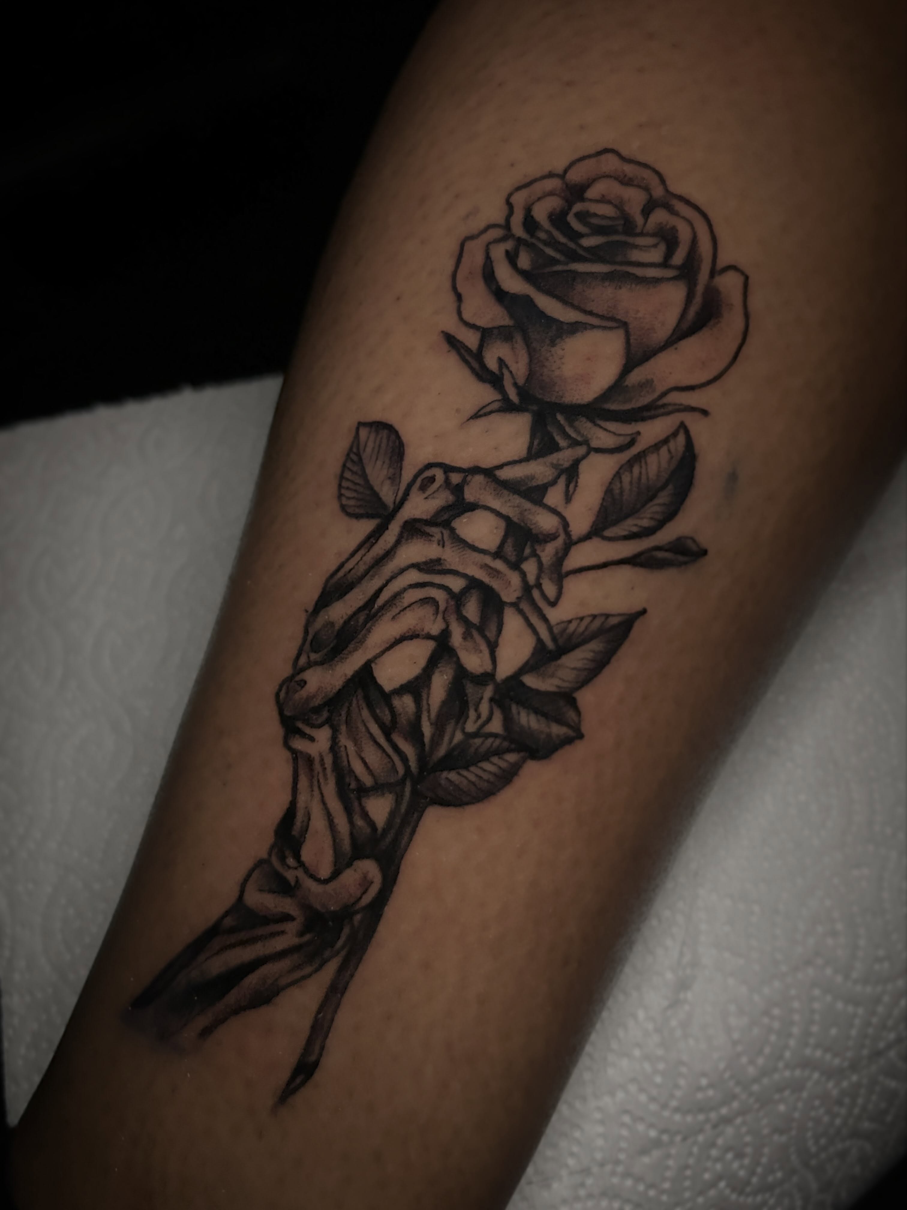 Rose and skeleton realism tattoo on the forearm by Marky
