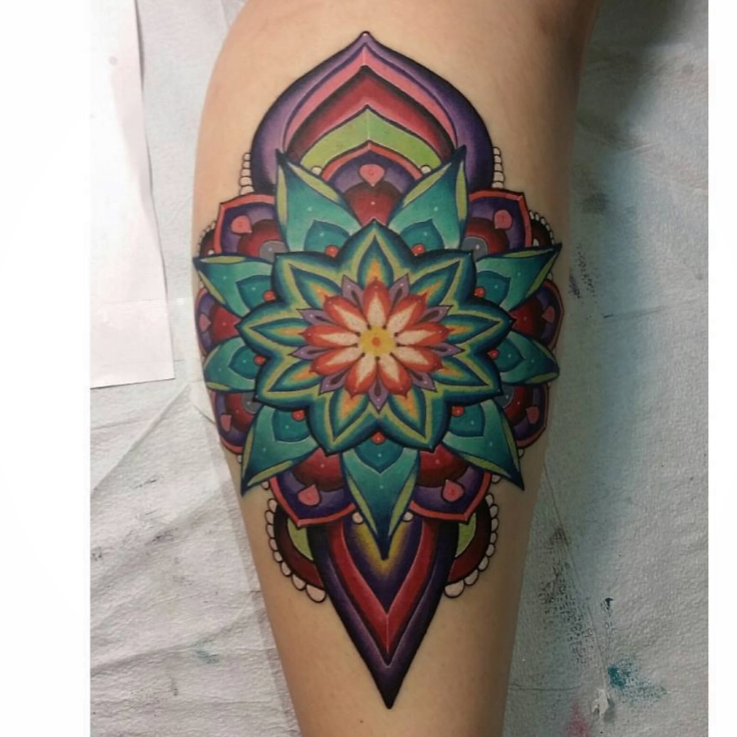 Mandala geometric tattoo on the thigh by David goldstein