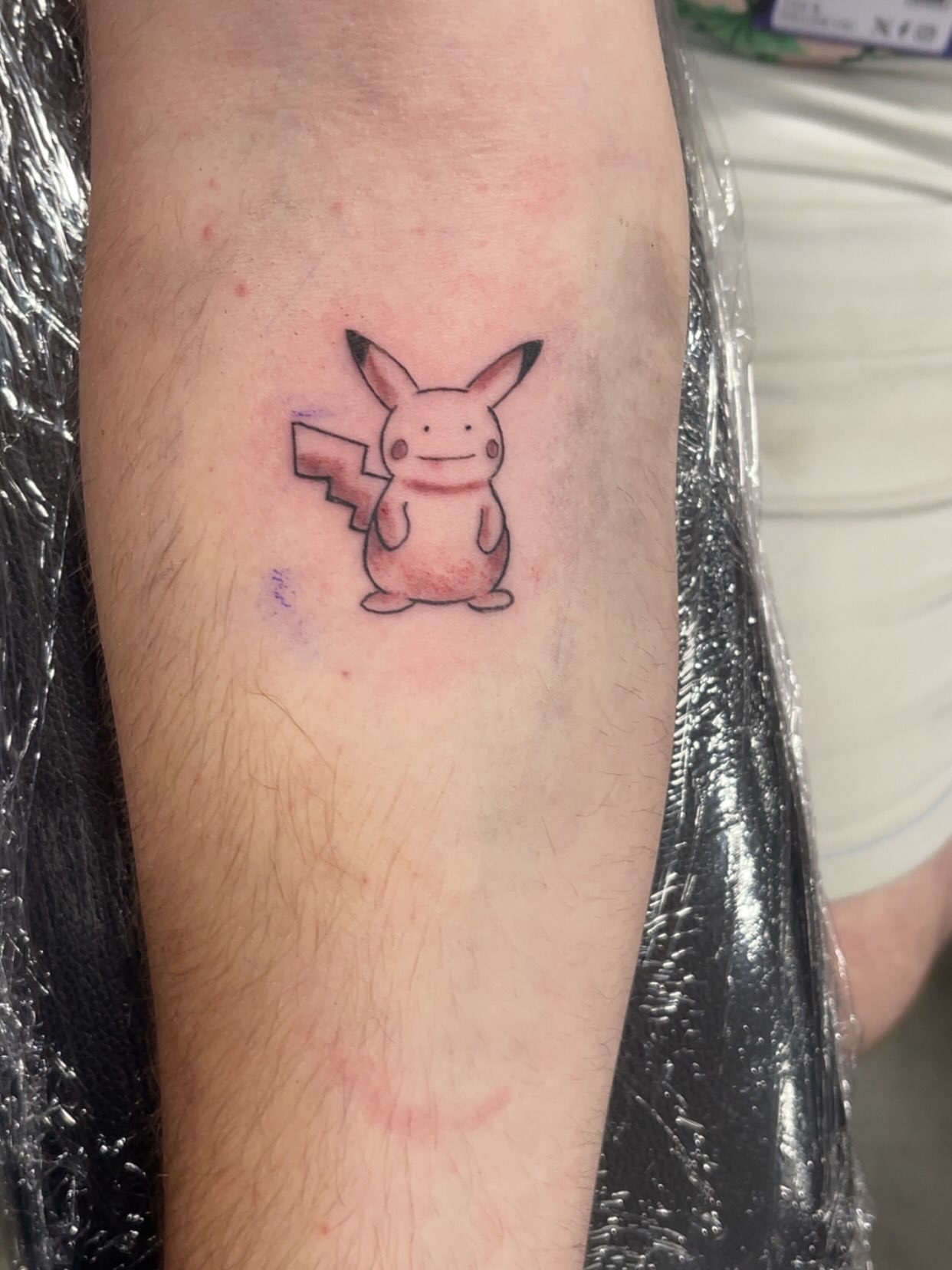 Pikachu dotwork tattoo on the forearm by Tattsruru
