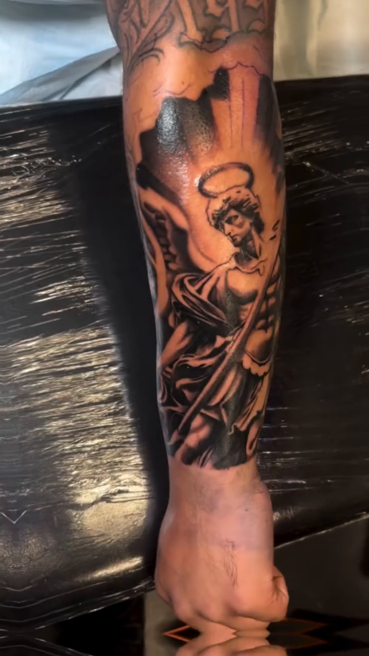 Angel with sword and halo realism tattoo by J.diaz🎖️