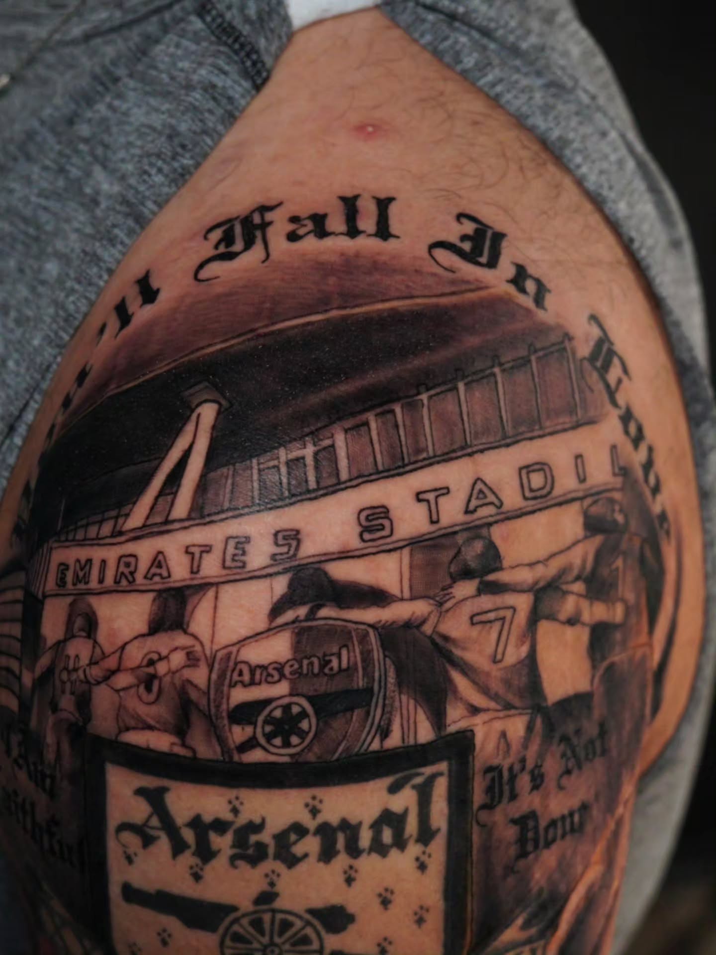 Arsenal football club black and grey tattoo on the shoulder by @tattoobytats