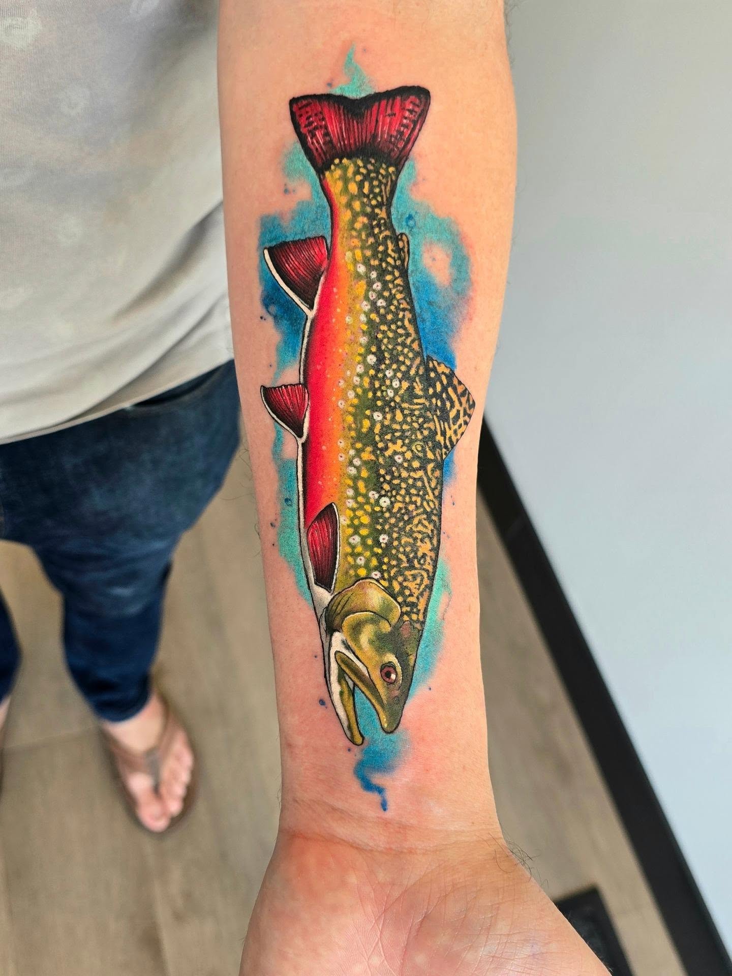 Brook trout dotwork tattoo on the forearm by Emily Louise Tattoos