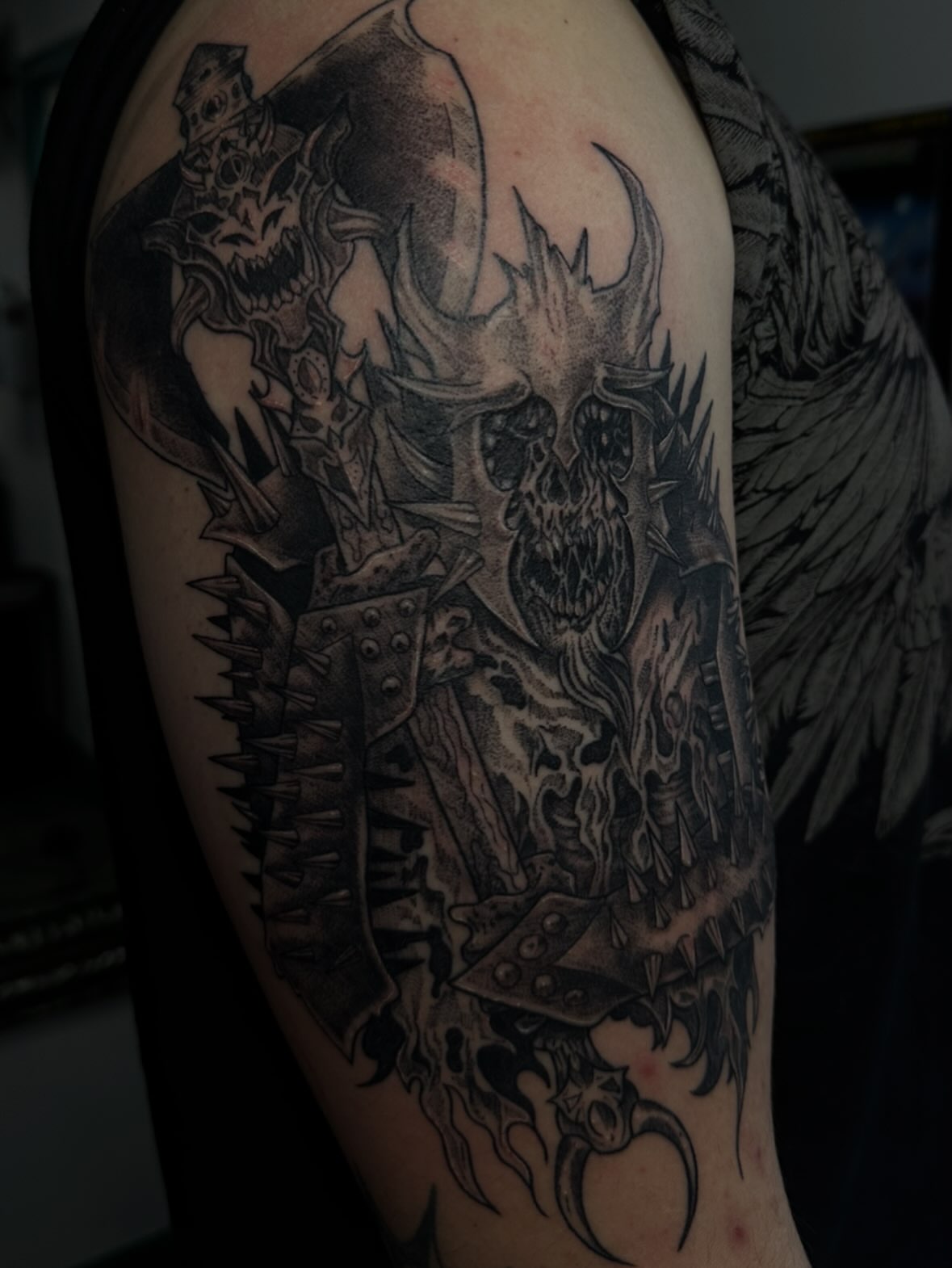Skull warrior dark realism tattoo on the shoulder by Maddie Neibert