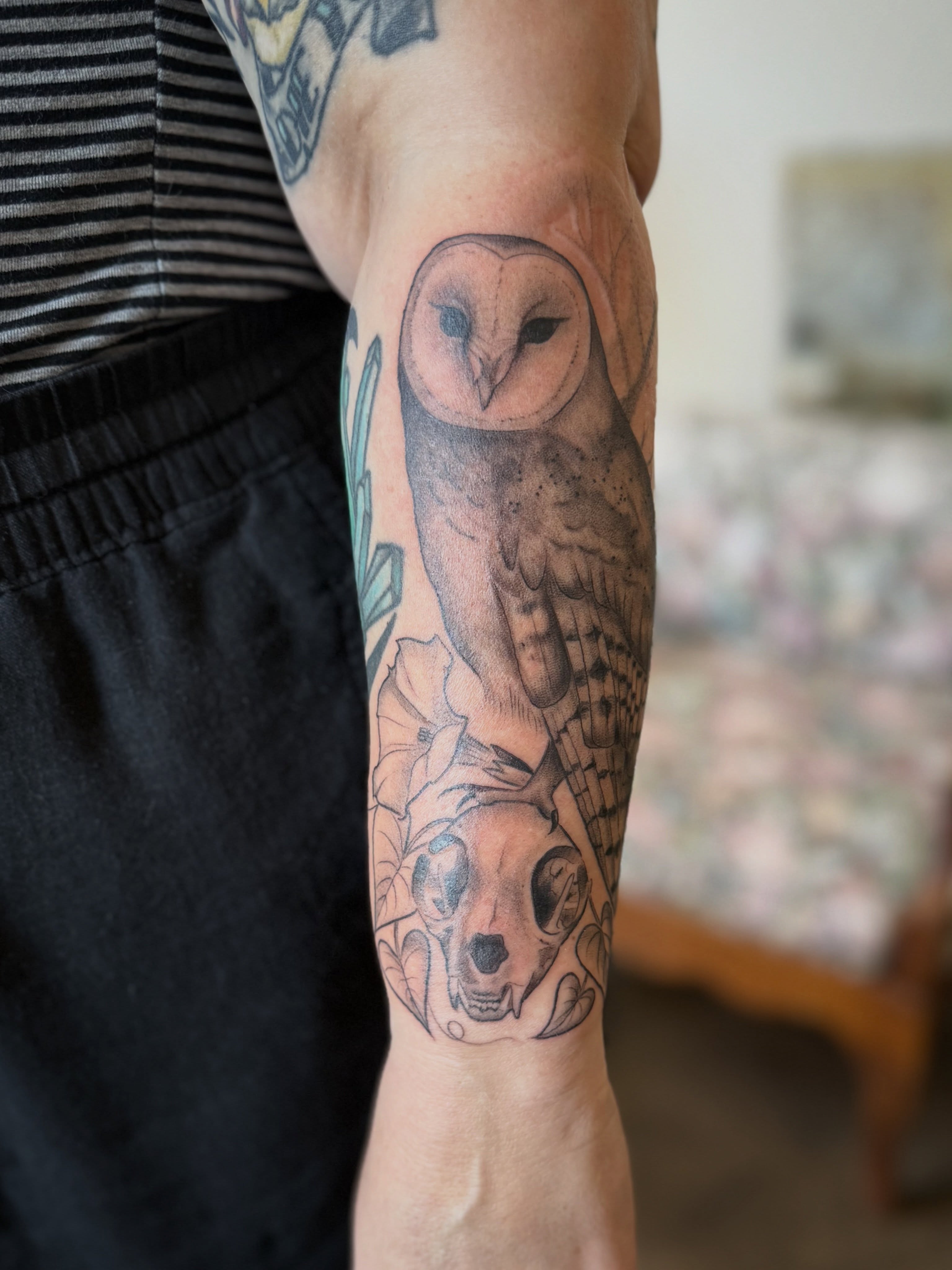 Owl and skull realism tattoo on the forearm by Leah - Tattoo Artist
