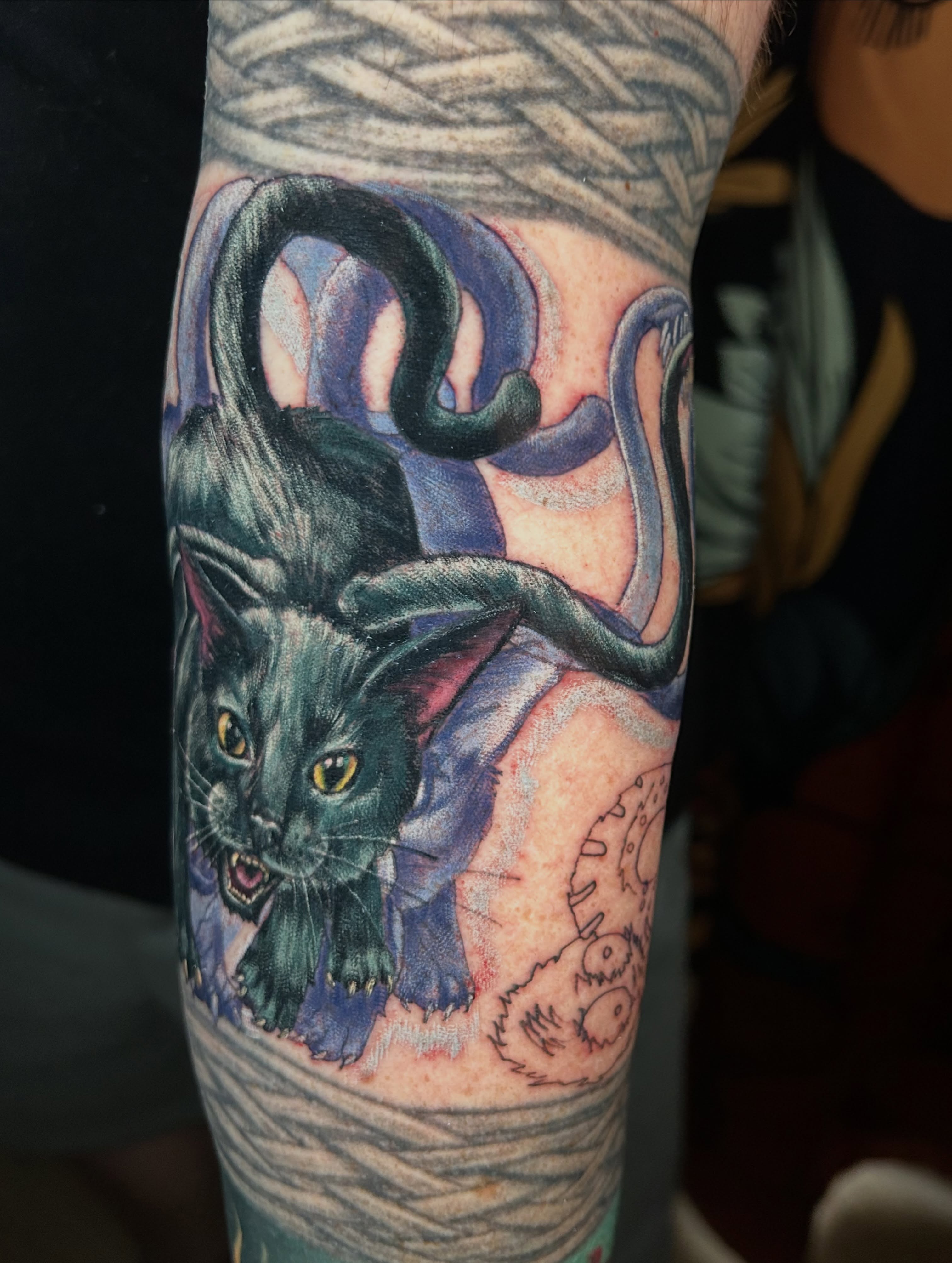 Cat with tentacles dark realism tattoo on the forearm by Paisley Diaz, Lombard, Illinois