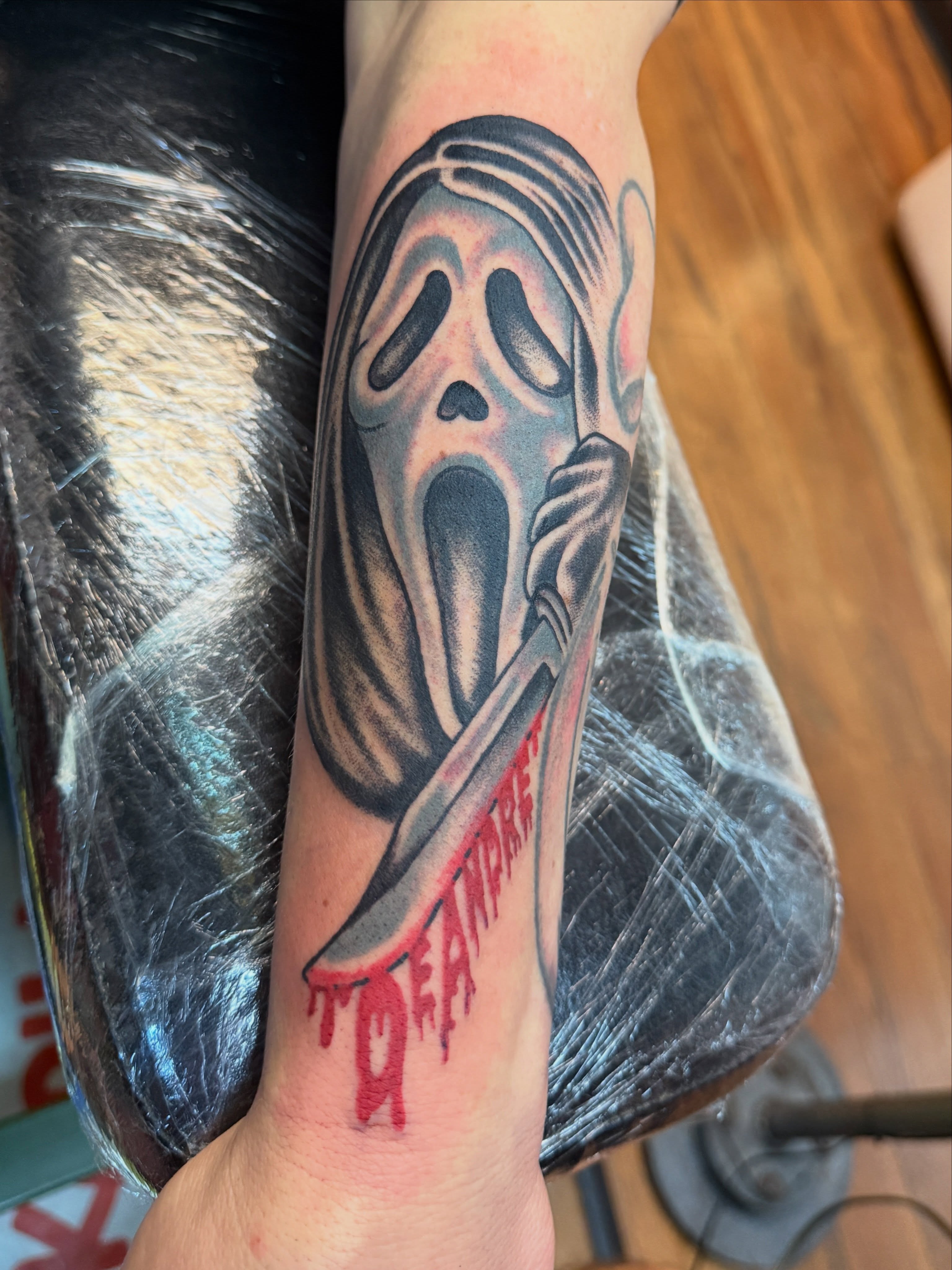 Ghost mask realism tattoo on the forearm by Angus Perfect, Philadelphia, Pennsylvania