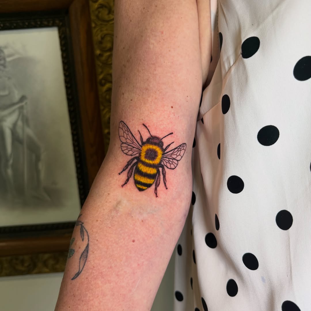 Bee realism tattoo on the forearm by Jorden Ruppe