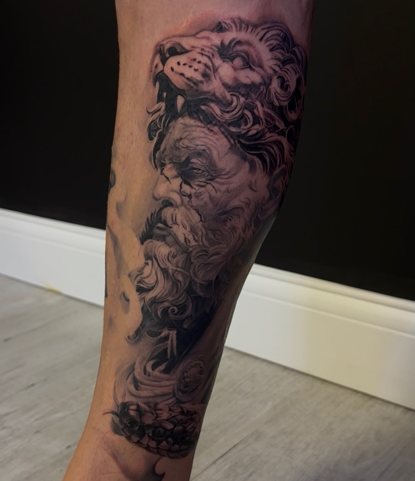Bearded man realism tattoo on the forearm by Eric RudeInk
