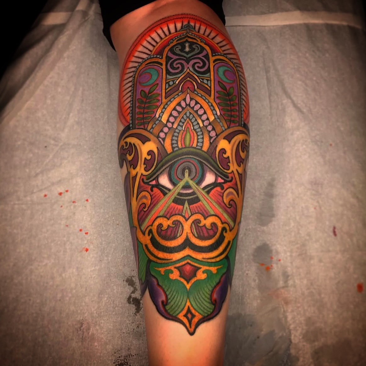 Mandala ornamental tattoo on the calf by David goldstein